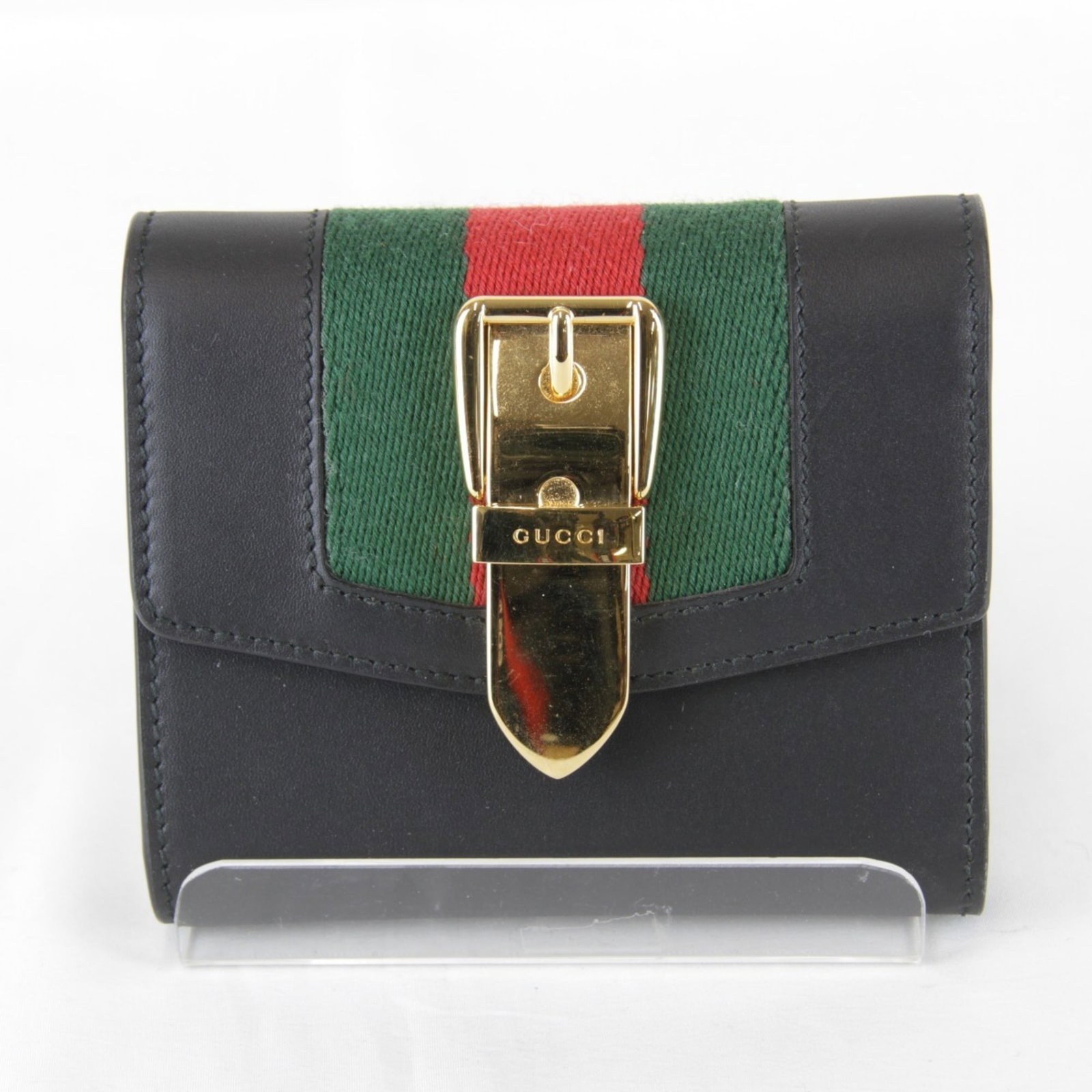Gucci Wallet (Tri-Fold): Gucci Wallet (Tri-Fold) Tri-fold Gucci Wallet from Italy, featuring a sleek black design with a compact 9.5cm x 11cm size. This classic wallet boasts a tri-fold structure, perfect for storing