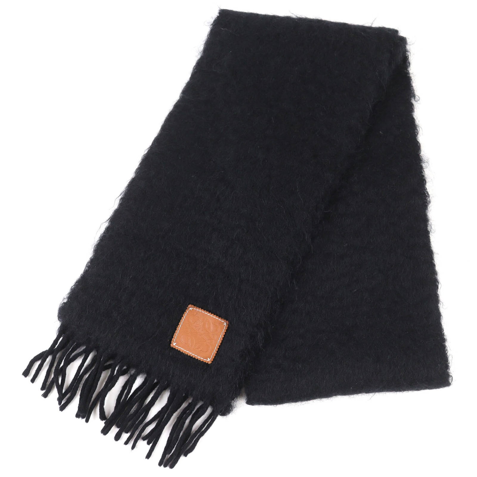 Loewe Stole Mohair Wool 50 48 Nylon: Loewe Stole Mohair Wool 50 48 Nylon Loewe's Stole is a stunning piece of fashion, boasting a striking black color and a unique blend of mohair, wool, and nylon materials. Measuring 1.82m x 22cm, this 