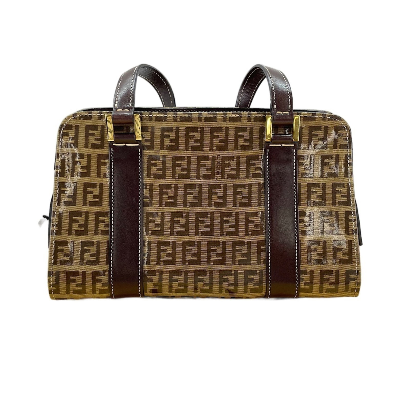 Handbag Fendi Zucchino: Handbag Fendi Zucchino The Fendi Zucchino handbag is a stylish and compact accessory, measuring 15cm x 24cm x 12cm. Made from the iconic Zucchino material, it boasts a rich brown color that adds a