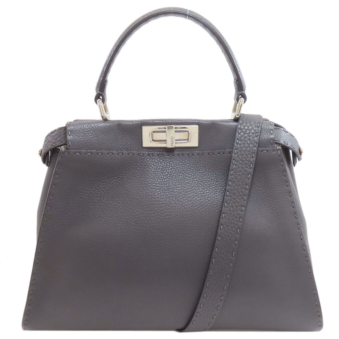 Medium Fendi Selleria Peekaboo 2Way Handbag Calf: Medium Fendi Selleria Peekaboo 2Way Handbag Calf Medium Fendi Selleria Peekaboo 2Way Handbag Calf. This Fendi handbag features a sleek gray exterior made from high-quality calf leather, showcasing a