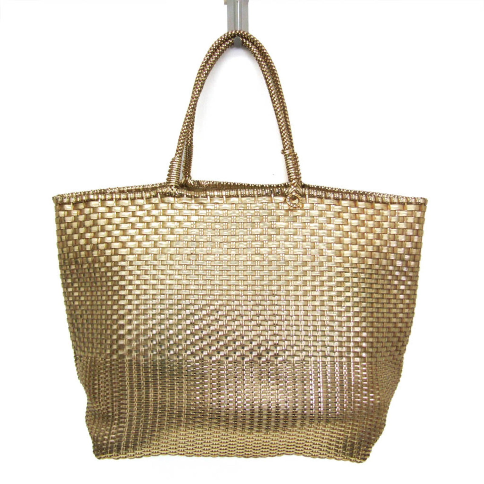 Tote Bag Anteprima Wire Pvc: Tote Bag Anteprima Wire Pvc The Anteprima Wire Pvc Tote Bag boasts a striking gold color and sturdy wire and PVC construction, making it a unique and durable accessory. With a spacious pouch and open