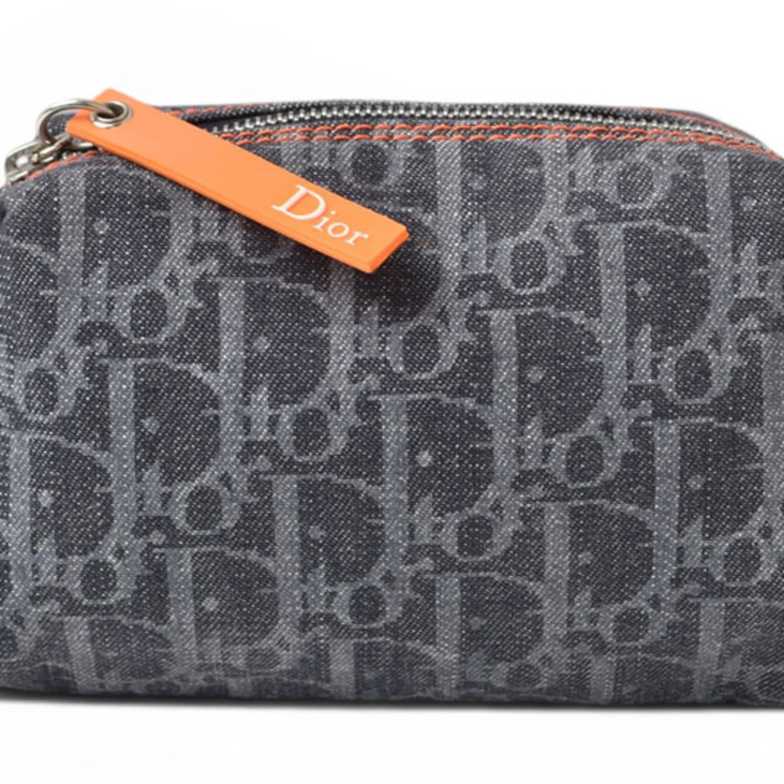Christian Dior Navy Denim Flight Trotter Pouch Line: Christian Dior Navy Denim Flight Trotter Pouch Line Navy Denim Flight Trotter Pouch Line from Christian Dior features a classic design with a canvas material, measuring 9.5cm x 17.5cm x 5.5cm. This