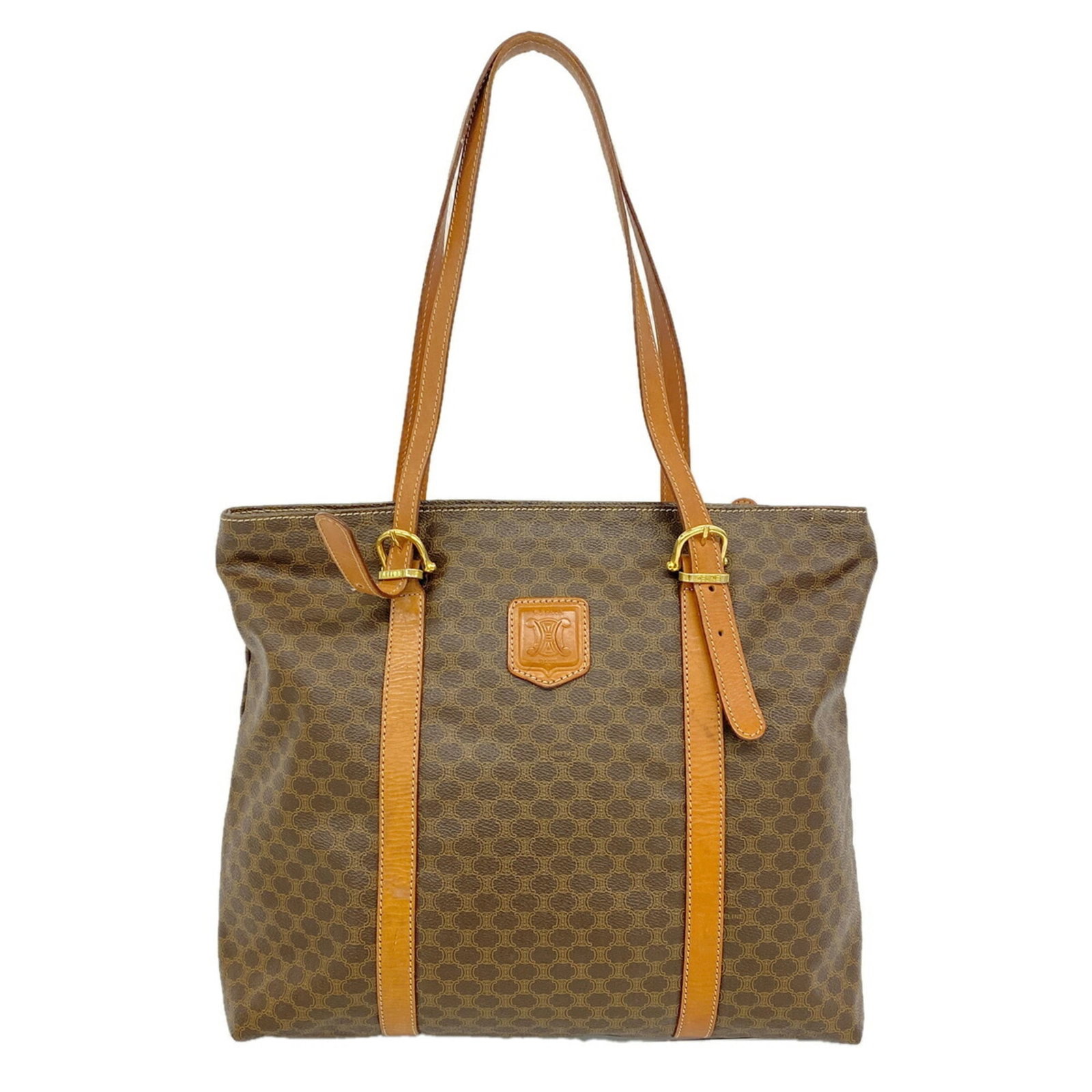 Celine Tote PVC: Celine Tote PVC The Celine Tote PVC is a stylish and durable bag made from high-quality PVC material, featuring a classic brown color and gold hardware details. Measuring 31cm x 35.5cm x 10.5cm, this