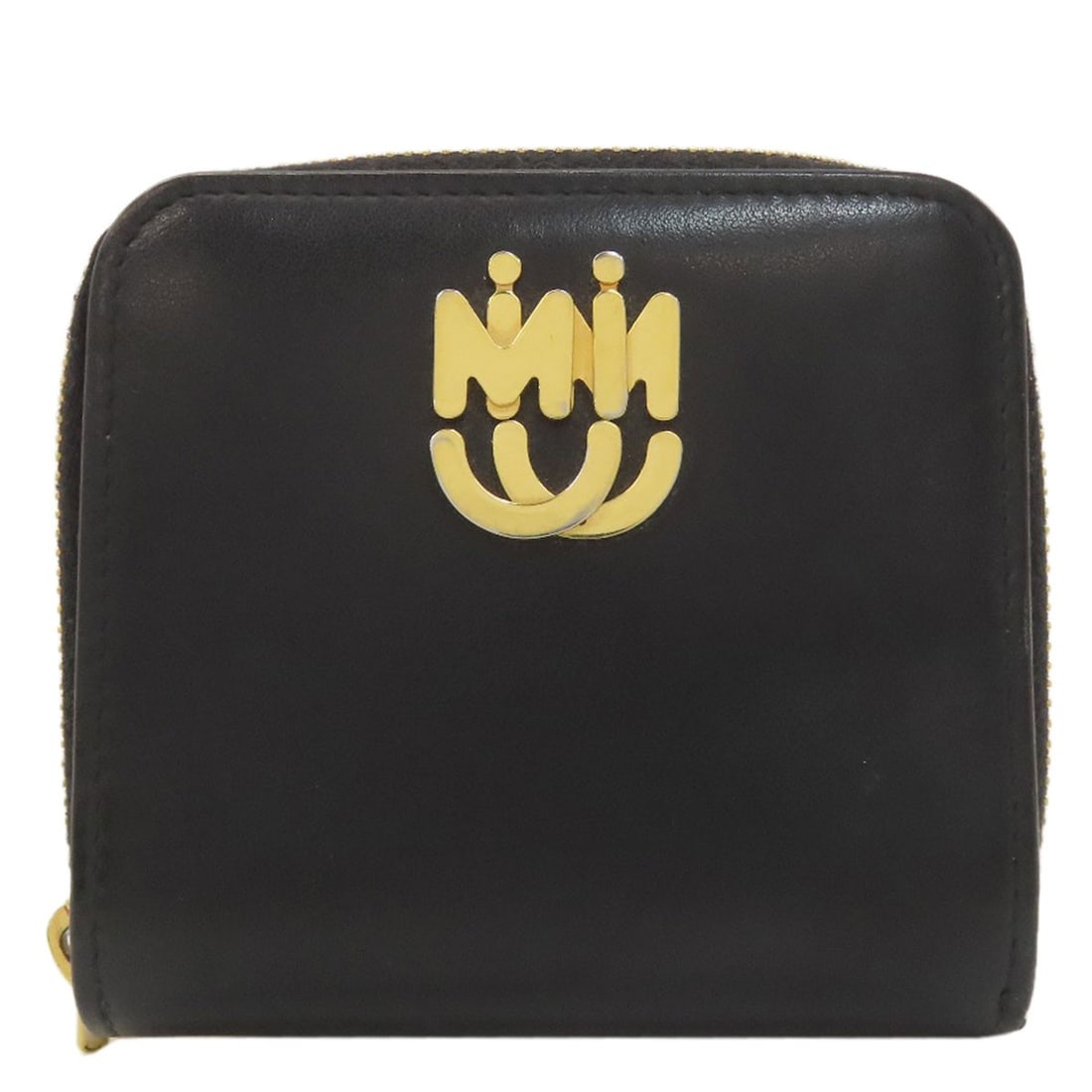 Miumiu Logo Bifold Wallet With Coin Pocket Leather: Miumiu Logo Bifold Wallet With Coin Pocket Leather Black leather bifold wallet with a coin pocket, designed with a classic style that suits everyday use. The MIUMIU logo is prominently featured on