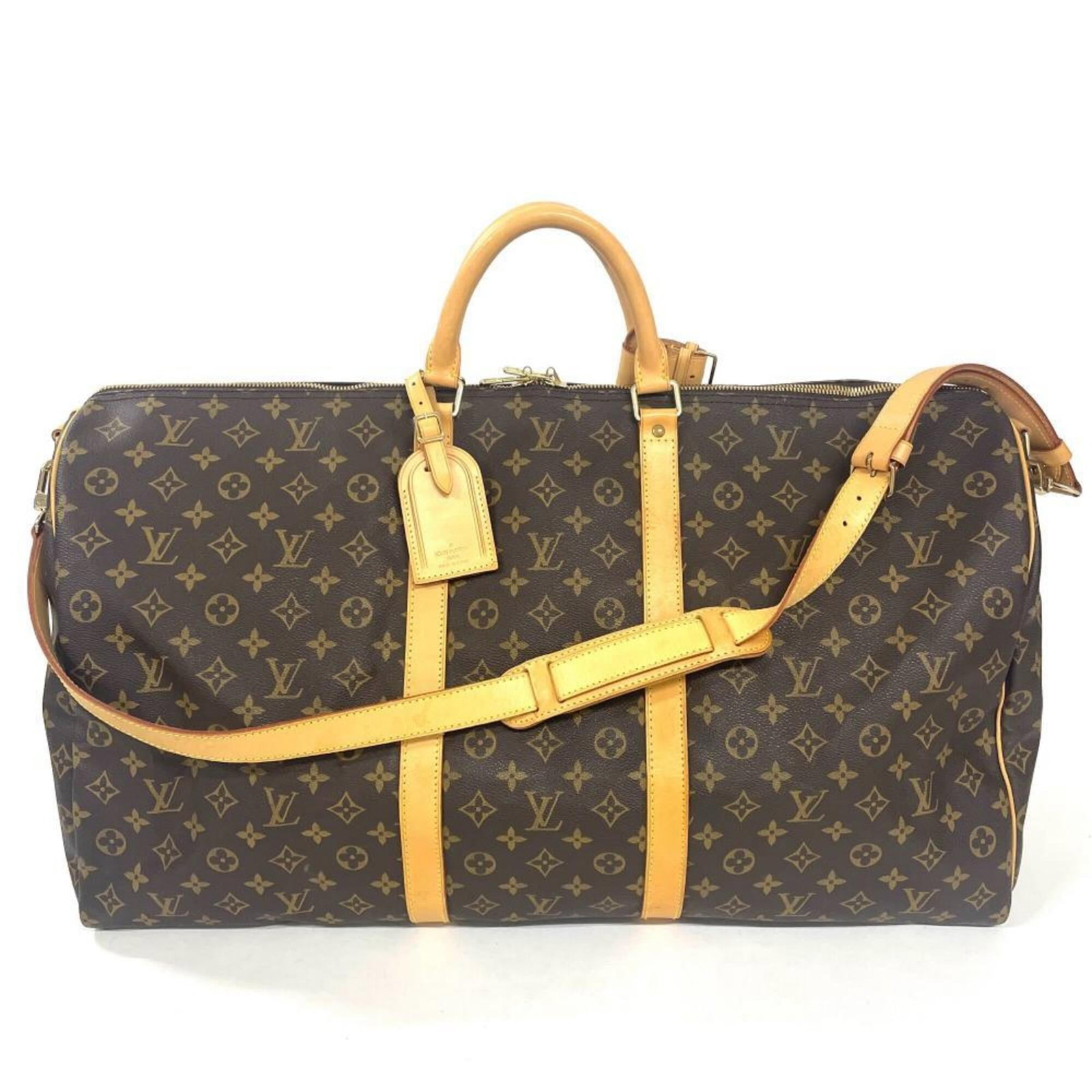 Louis Vuitton Boston Bag Monogram Leather: Louis Vuitton Boston Bag Monogram Leather Monogrammed leather and classic design make this Louis Vuitton Boston bag a timeless choice. The bag's signature monogram pattern and brown leather color add