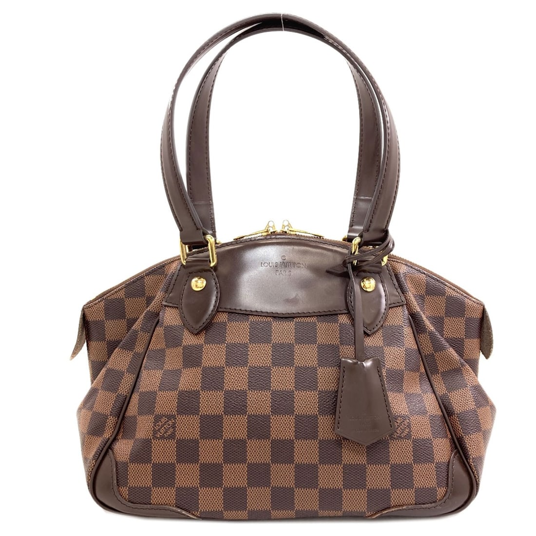 Vuitton Handbag Louis Verona Damier Canvas: Vuitton Handbag Louis Verona Damier Canvas Brown Damier canvas Louis Verona handbag from LOUIS VUITTON. This classic style features the iconic Damier canvas exterior, a timeless design element of the