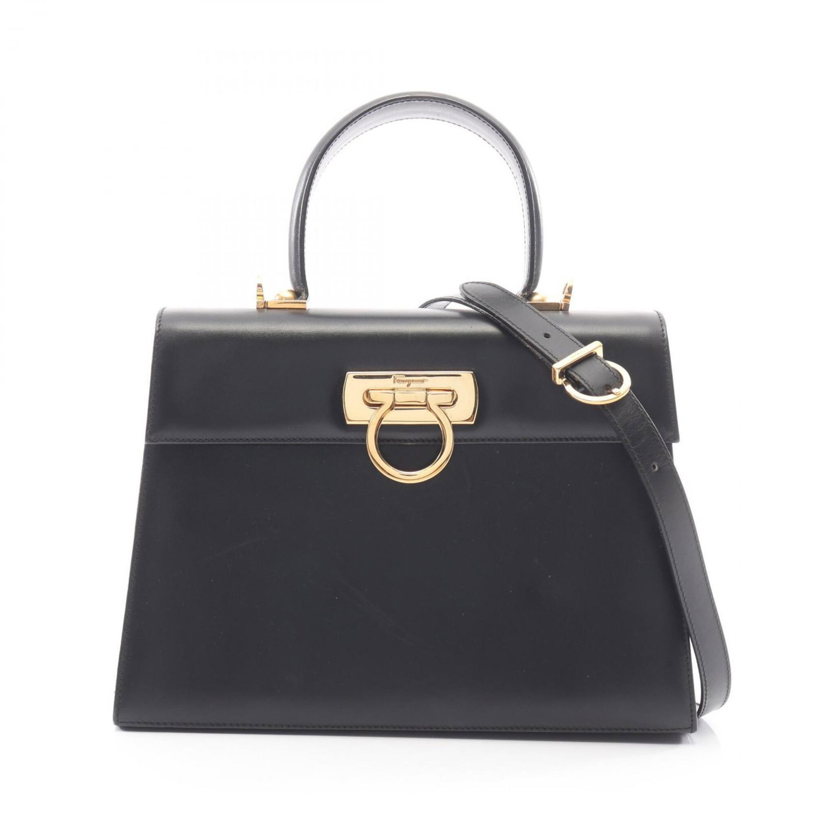 Salvatore Ferragamo Handbag Leather: Salvatore Ferragamo Handbag Leather Black Salvatore Ferragamo handbag made from high-quality leather, measuring 20cm x 27cm x 10cm. This stylish bag features a sleek design and durable construction,