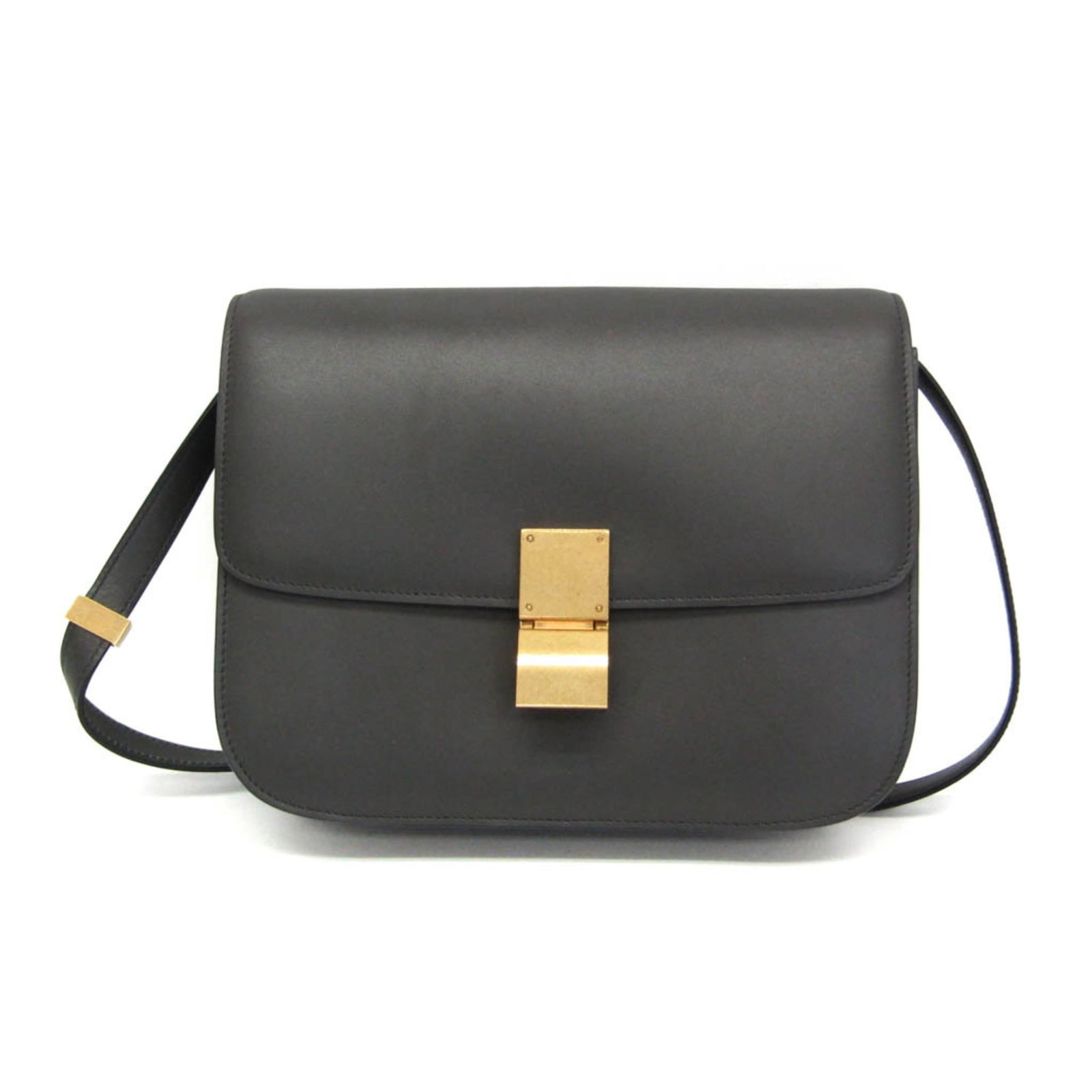 Shoulder Bag Leather Celine: Shoulder Bag Leather Celine The Celine shoulder bag is a timeless classic made from high-quality calfskin leather, featuring a sleek gray color and a versatile clip closure. With two practical pockets