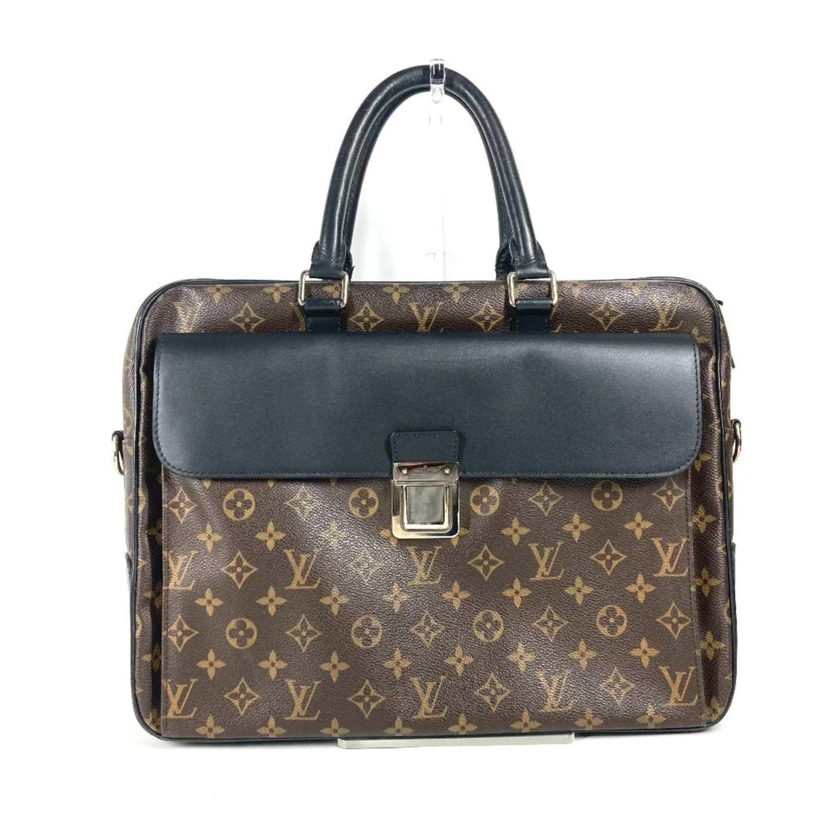 Louis Vuitton Briefcase Shoulder Bag Monogram Canvas: Louis Vuitton Briefcase Shoulder Bag Monogram Canvas Monogram canvas design adds a touch of timeless elegance to this sleek black briefcase shoulder bag from Louis Vuitton. Measuring 30cm x 38cm x