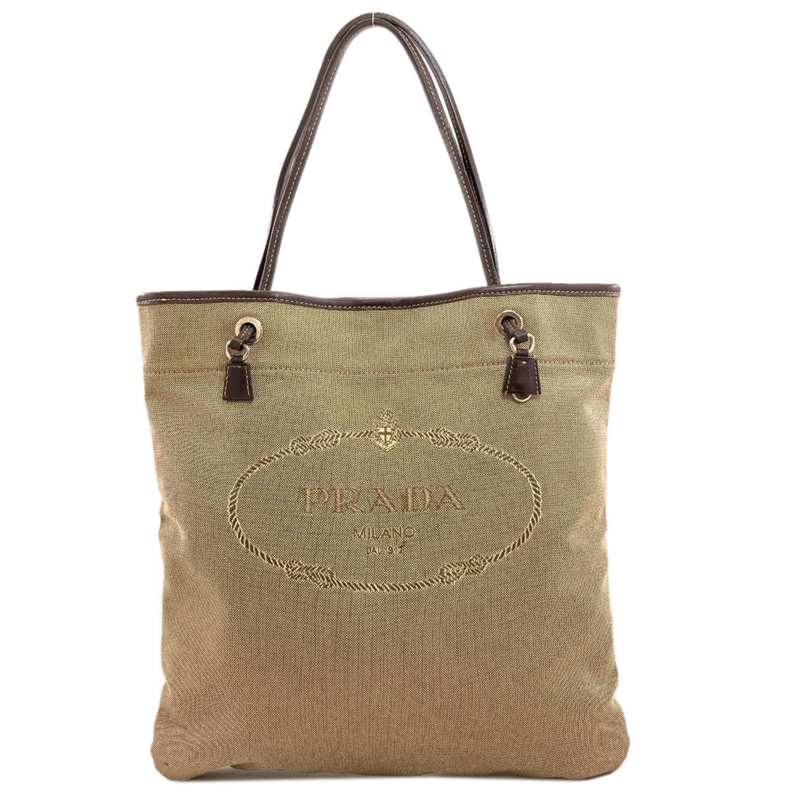 Canvas Prada Tote: Canvas Prada Tote Canvas Prada Tote in Brown, 36.5cm x 35cm x 1cm. This canvas tote bag features a classic design and a sturdy canvas material. The brown color adds a touch of elegance to this timeles