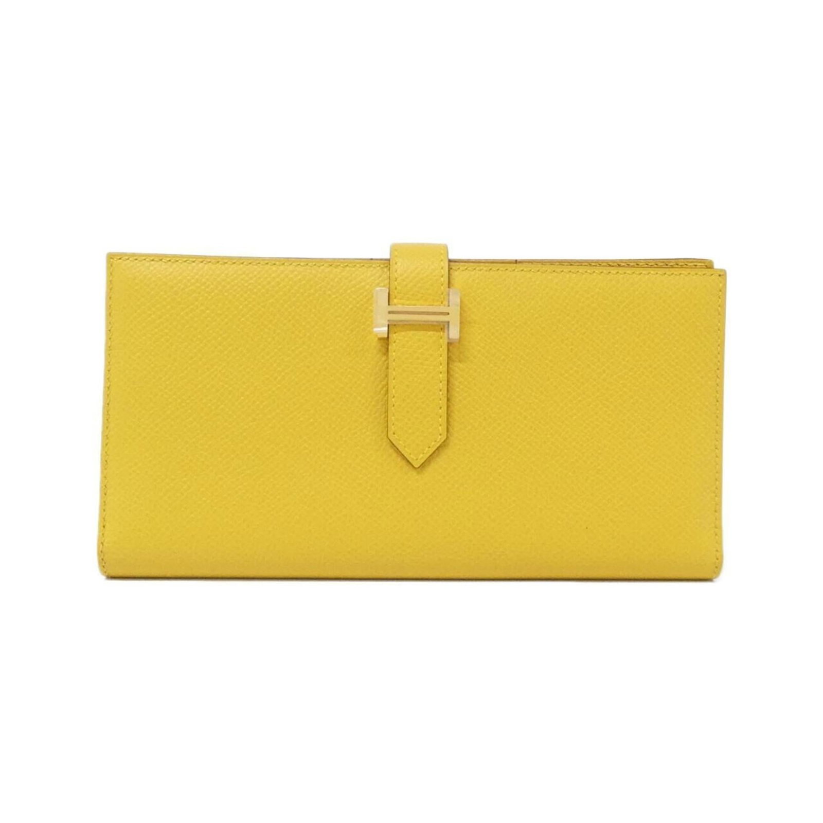 Epsom Leather Bi fold Wallet Hermes: Epsom Leather Bi fold Wallet Hermes Epsom leather bi-fold wallet from Hermes, measuring 9cm x 17.5cm x 1.5cm, features a vibrant yellow color and classic design. The wallet's Epsom leather material pr