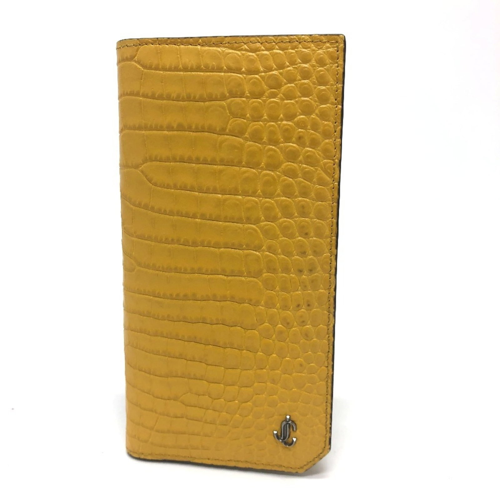 Long Wallet (Bi-Fold) Leather by Jimmy Choo: Long Wallet (Bi-Fold) Leather by Jimmy Choo The Jimmy Choo Long Wallet is a stylish bi-fold leather wallet in a vibrant yellow color. Measuring 18cm x 9.5cm x 1.5cm, it features a classic design with