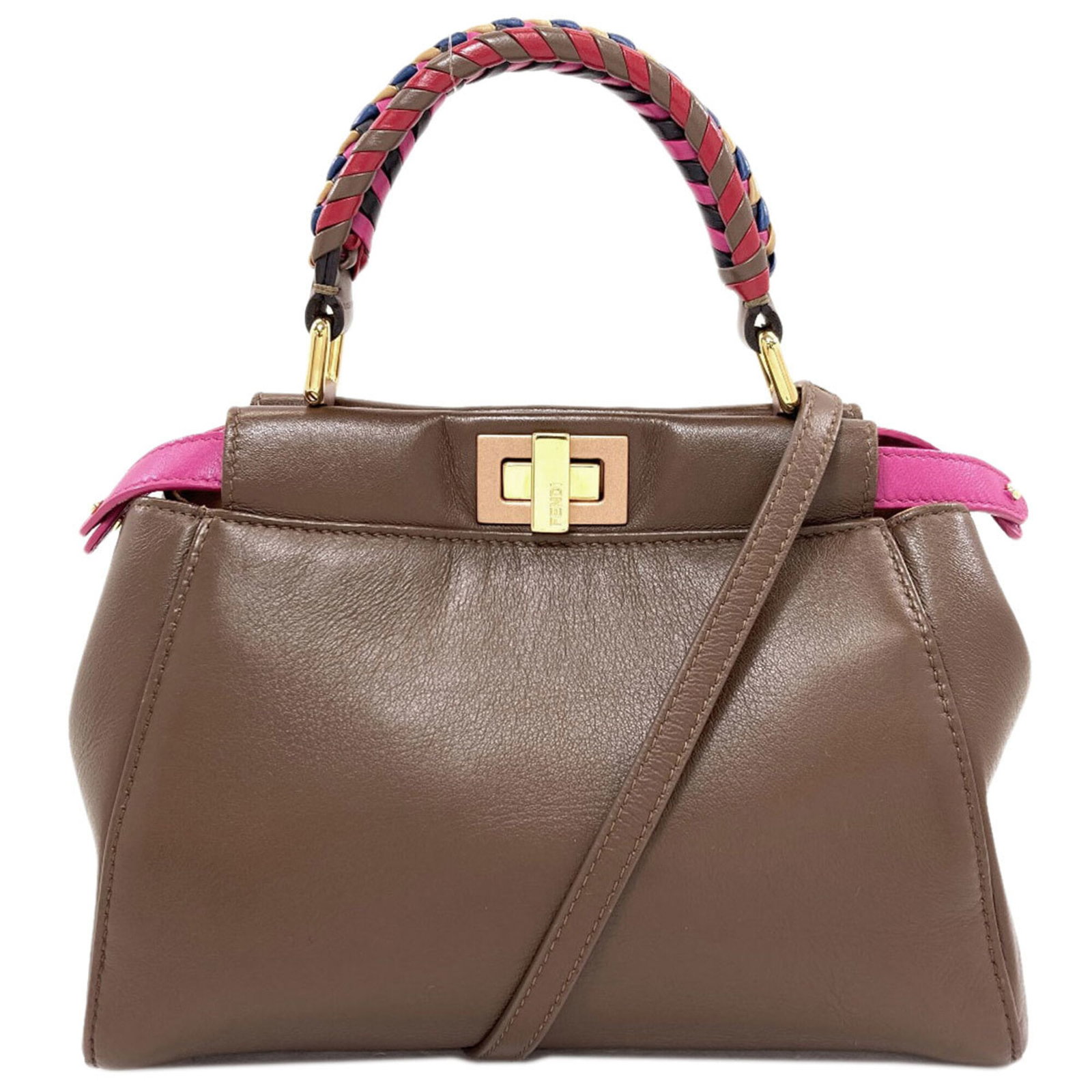 Handbag Leather Fendi: Handbag Leather Fendi Brown and Pink Fendi Handbag. Made from high-quality leather, this 18cm x 23cm x 11.5cm handbag features a unique combination of brown and pink hues. With its classic design and 