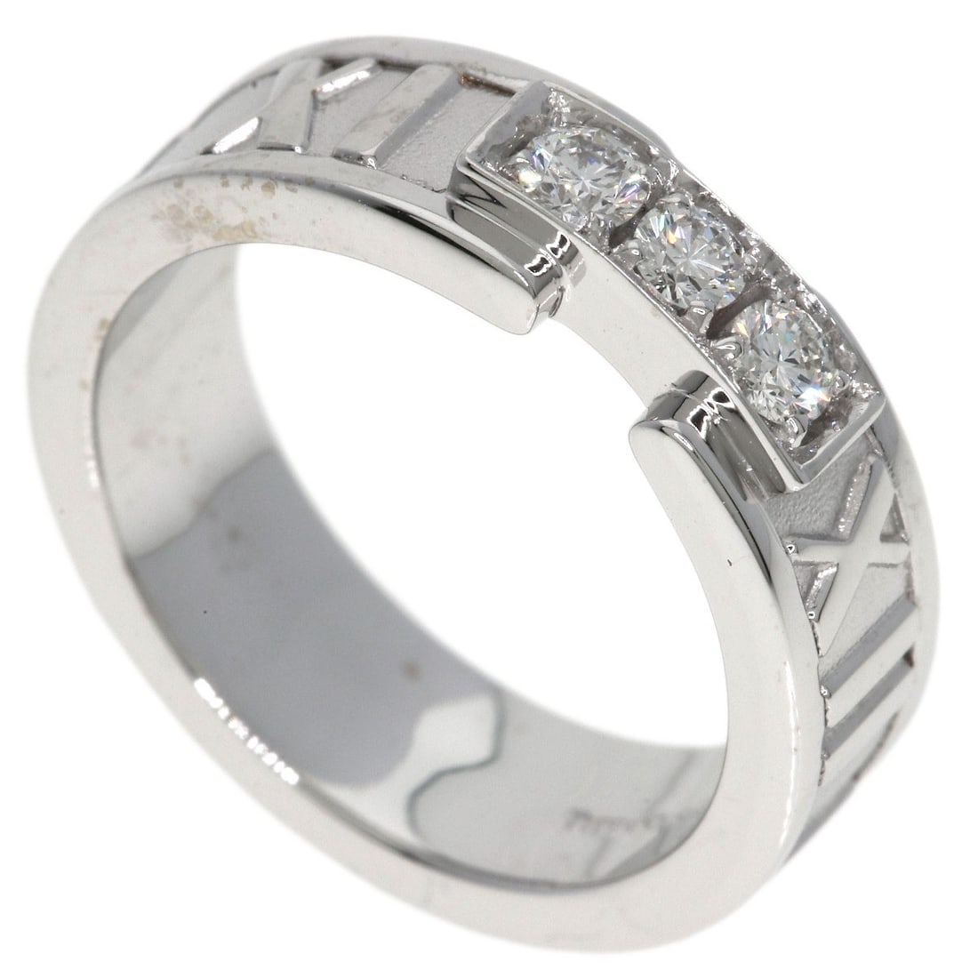 Tiffany Co Atlas K18 White Gold Diamond Ring: Tiffany Co Atlas K18 White Gold Diamond Ring K18 White Gold Diamond Ring from Tiffany & Co. features a high-quality diamond set in a sleek, silver-toned K18 white gold band. The ring's 4.5 US size