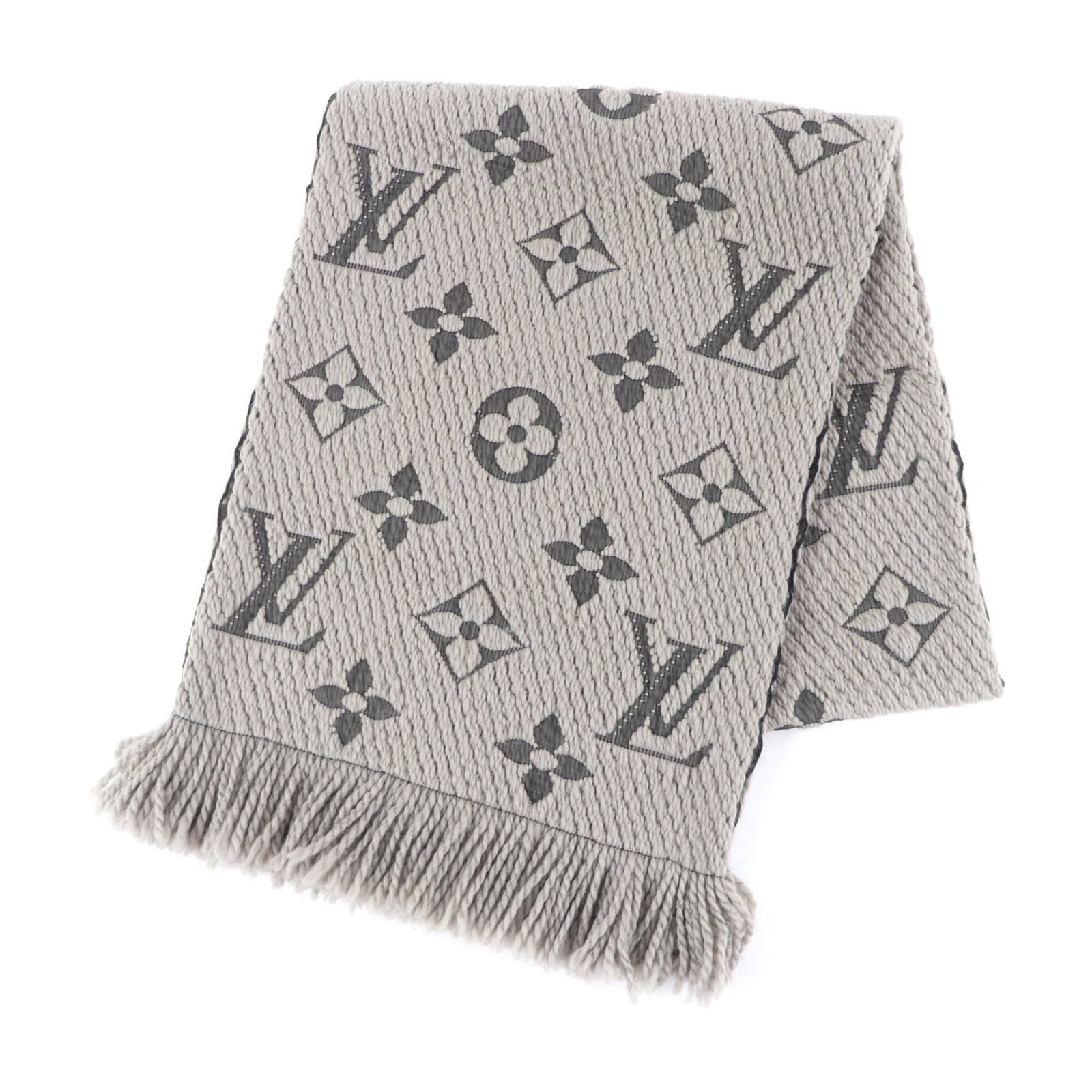 Louis Vuitton Stole Wool 94% Silk 6%: Louis Vuitton Stole Wool 94% Silk 6% Woven from luxurious 94% wool and 6% silk, this stunning Louis Vuitton stole boasts a striking 1.51m x 30cm size, perfect for making a statement. The Italian