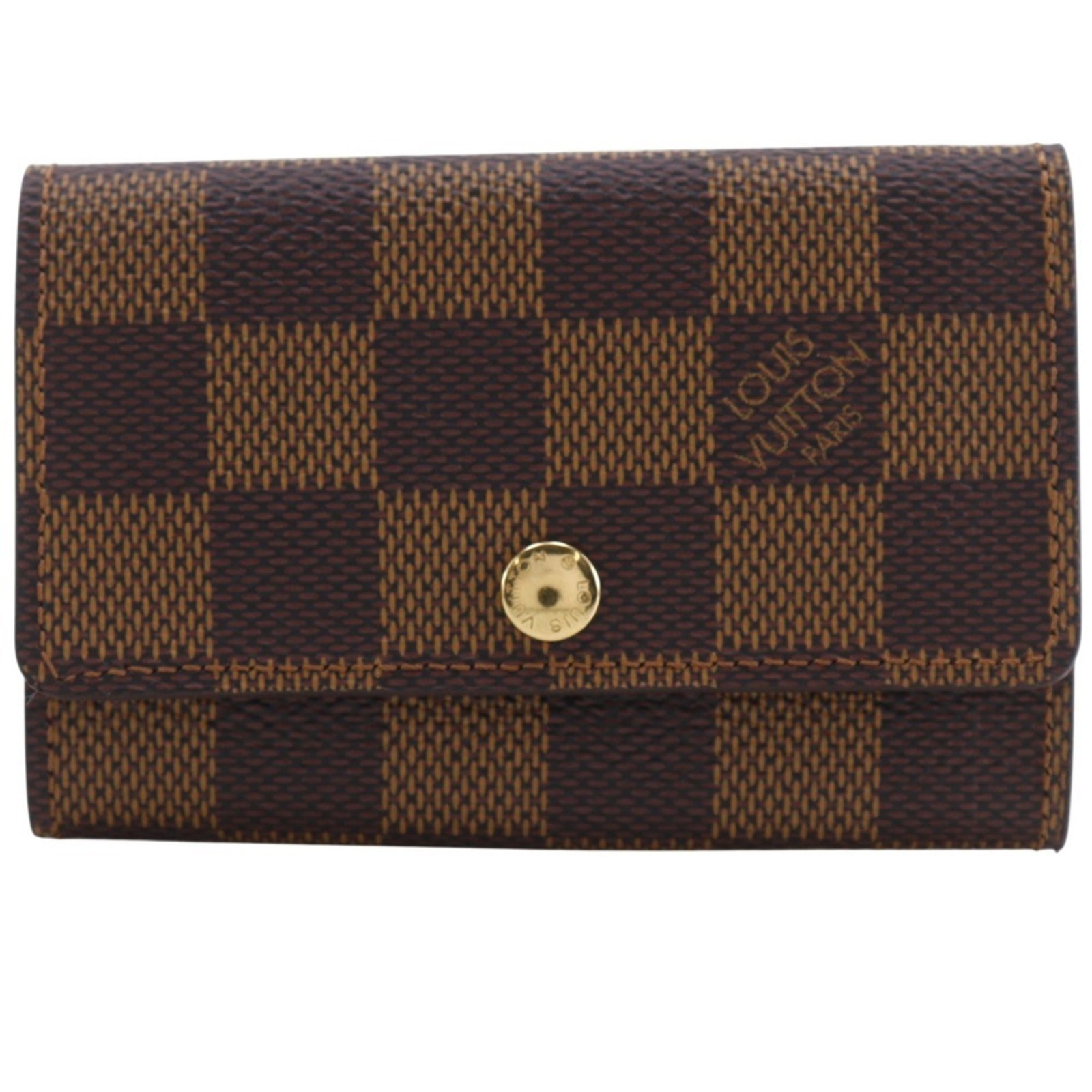 Keycase Damier Canvas Louis Vuitton: Keycase Damier Canvas Louis Vuitton Damier Canvas Louis Vuitton keycase in brown, made from high-quality Damier Canvas material, features a classic design with a signature. The compact size of 7cm x