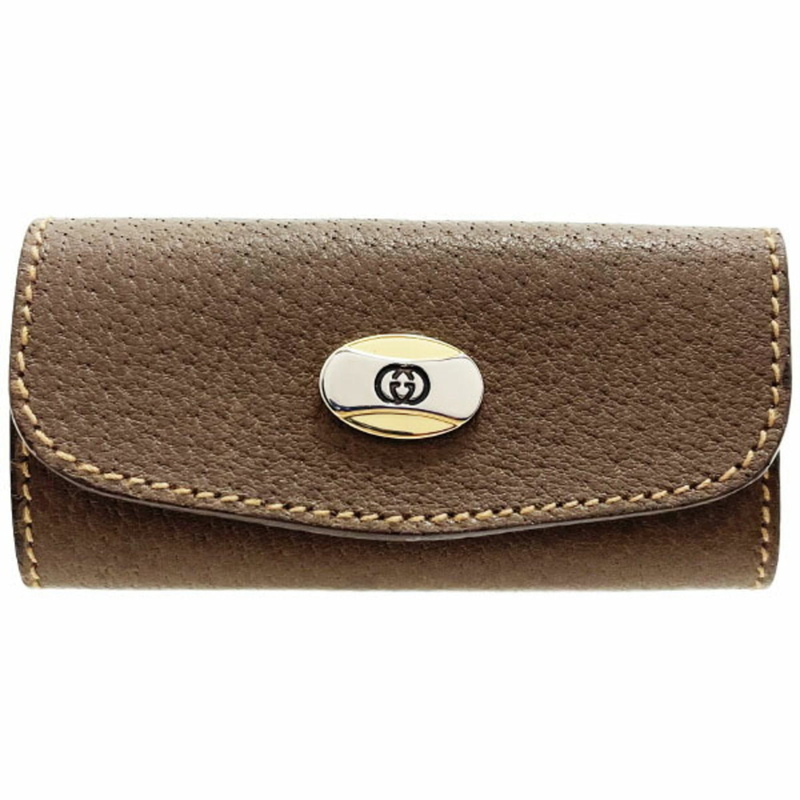 Keycase Leather Gucci: Keycase Leather Gucci Keycase Leather Gucci is a compact, brown leather accessory. It features a signature and measures 4.5cm x 9cm x 1.8cm. The item comes in its original box. Item Specifics: Brand: 