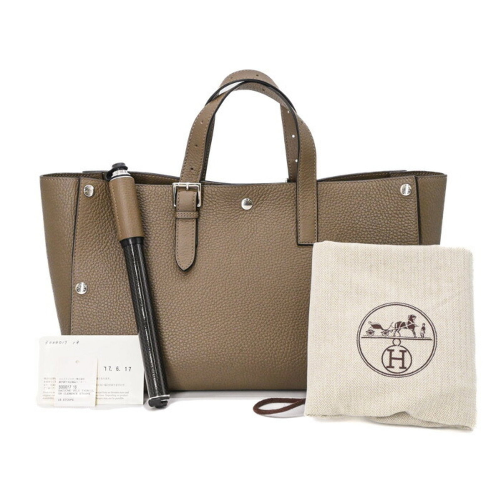Clemence Leather Handbag Taurillon Hermes: Clemence Leather Handbag Taurillon Hermes Taurillon clemence leather gives this handbag a unique, sophisticated look. With its Etoupe gray color and sleek design, it's a stylish accessory for any