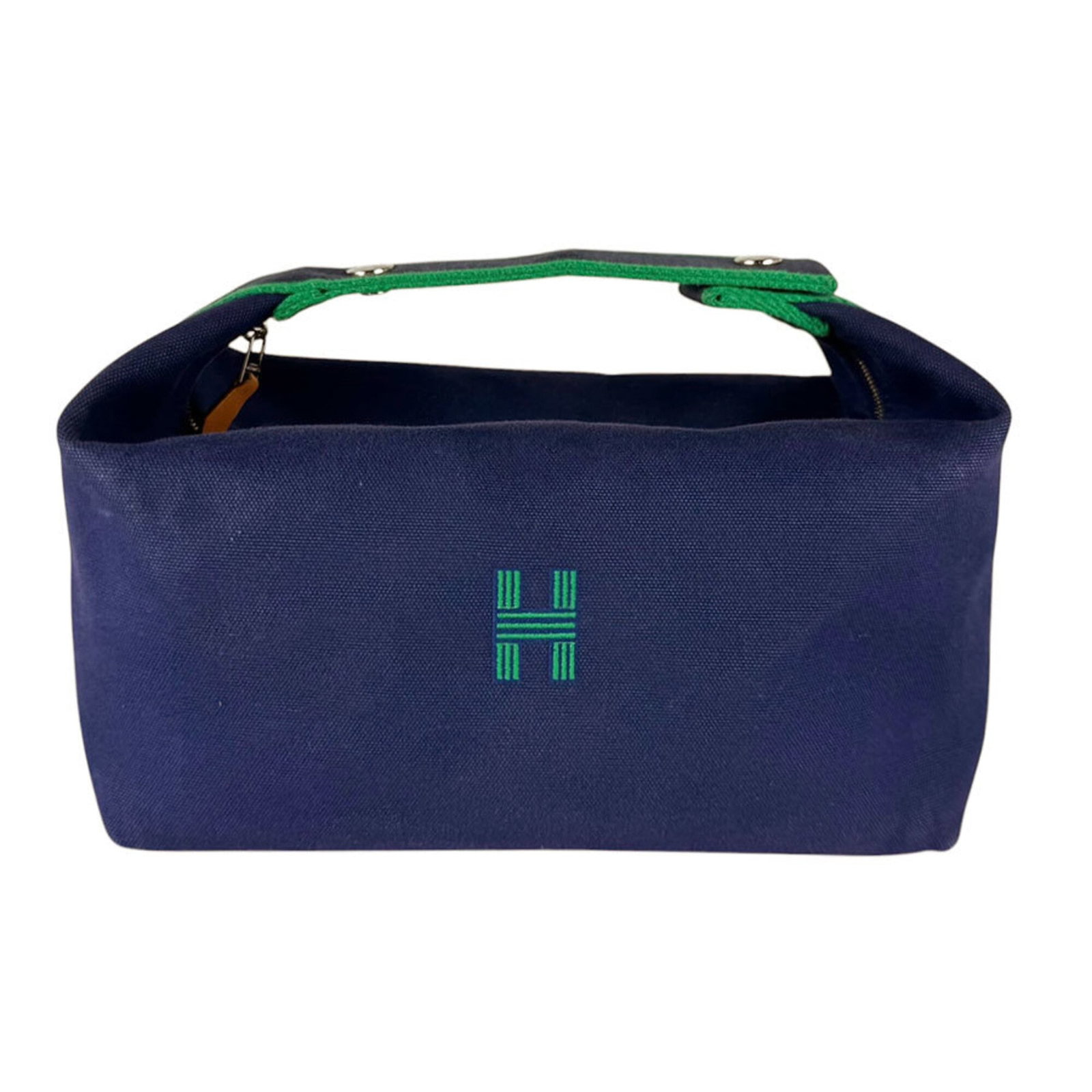 Pouch Canvas Hermes: Pouch Canvas Hermes Canvas pouch from the iconic French fashion brand Hermes, featuring a striking blue and green color combination. Made from high-quality canvas material, this compact pouch measures