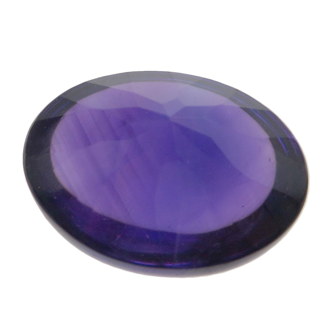 19.22Ct Amethyst Loose 3.8G: 19.22Ct Amethyst Loose 3.8G 19.22ct of rich, deep purple amethyst, showcasing its vibrant color in a loose, natural state. This substantial stone is a standout feature of SELECT JEWELRY's loose collec