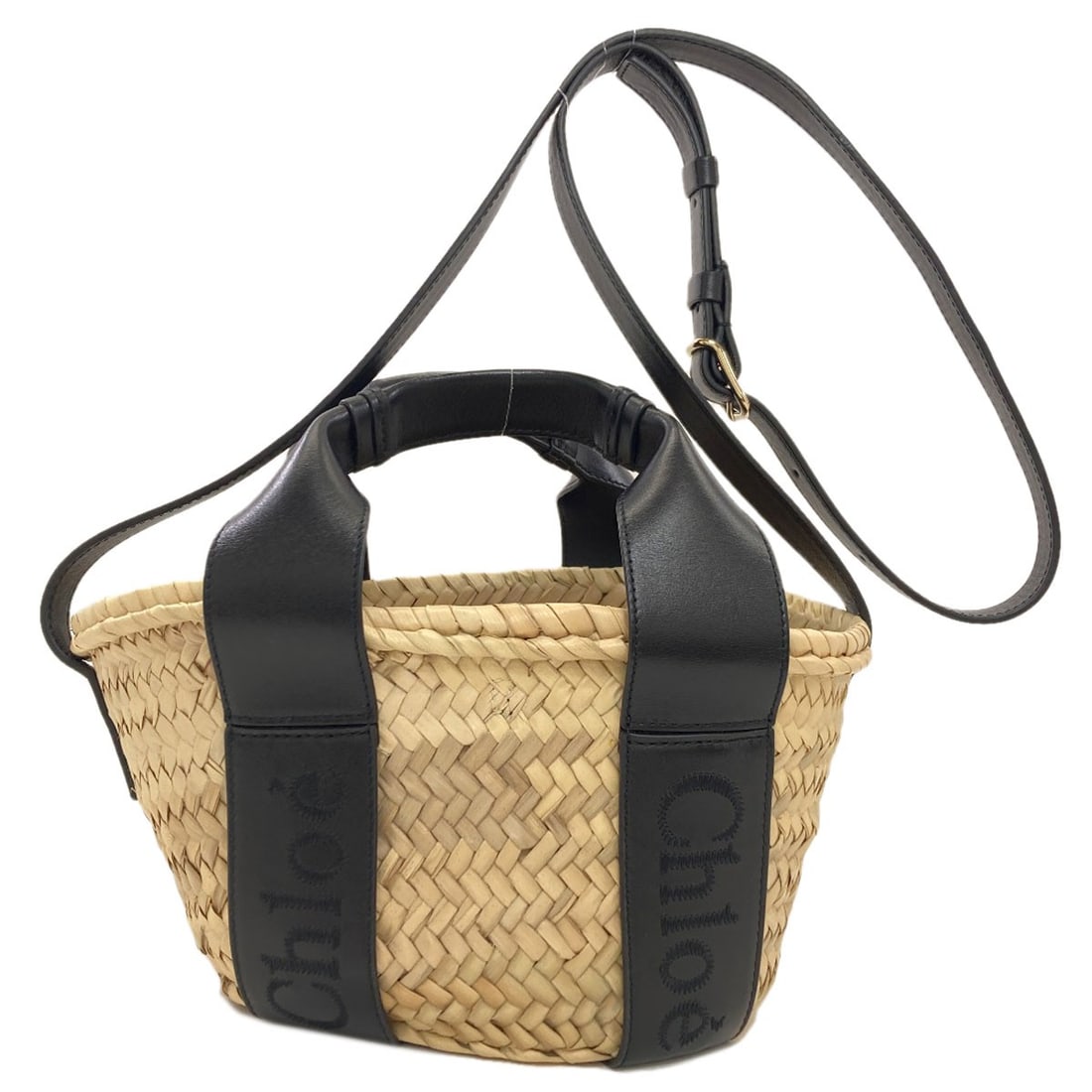 Raffia Chloe 2Way Handbag Small Basket: Raffia Chloe 2Way Handbag Small Basket Small and stylish, this Raffia Chloe 2Way Handbag measures 5.5 inches in height and 5.1 inches in depth, with a spacious interior and open closure. Made from hig
