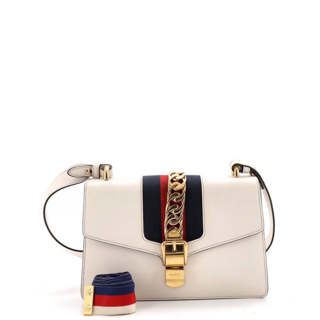 Small Leather Bag Sylvie Gucci: Small Leather Bag Sylvie Gucci Small Leather Bag Sylvie Gucci in White. This small shoulder bag features a white leather exterior with a neutral microfiber interior, gold hardware, and a sturdy gold