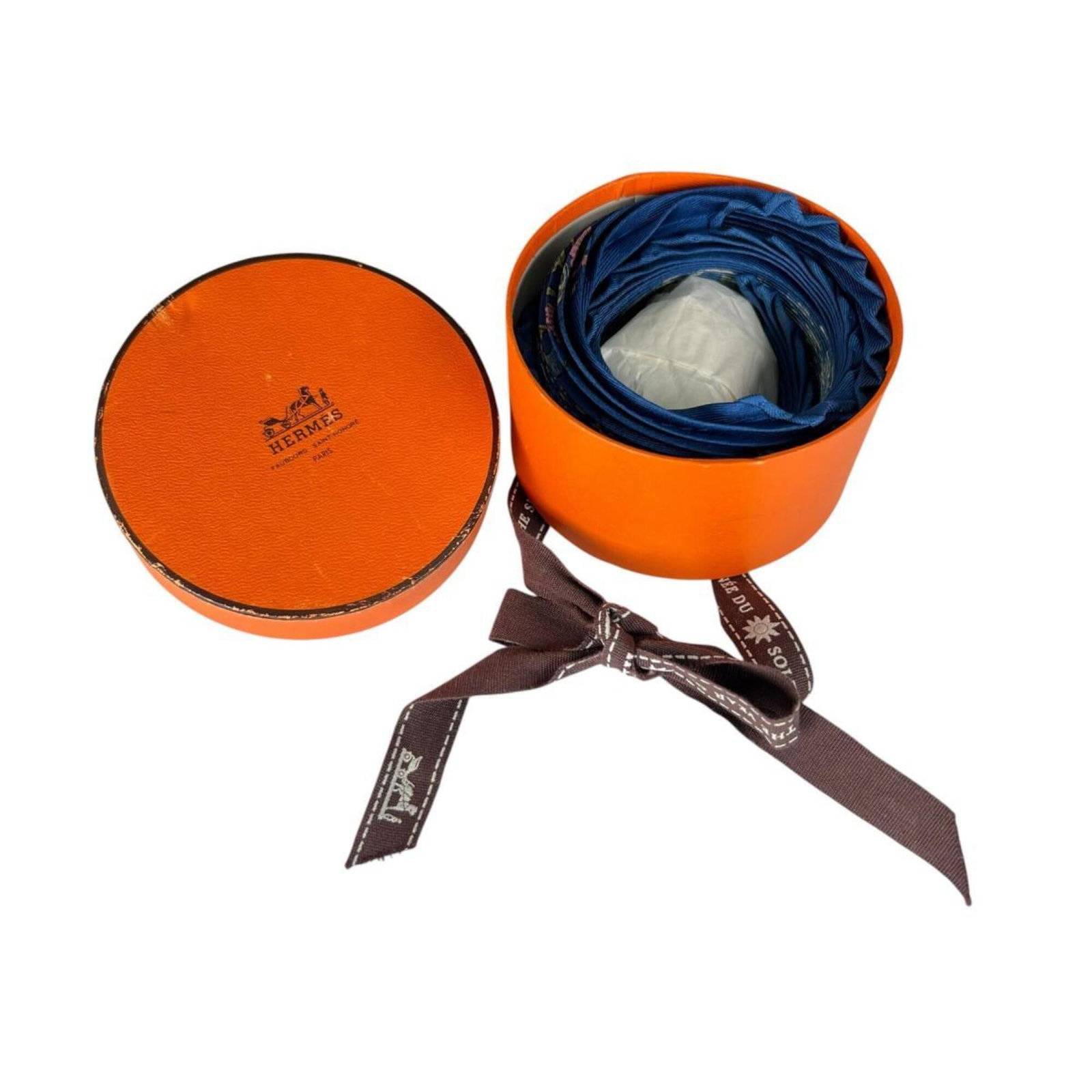 Silk Hermes Scarf: Silk Hermes Scarf Silk from the renowned French fashion house, this 40cm x 40cm blue silk scarf is crafted from high-quality material, making it a beautiful addition to any wardrobe. The classic