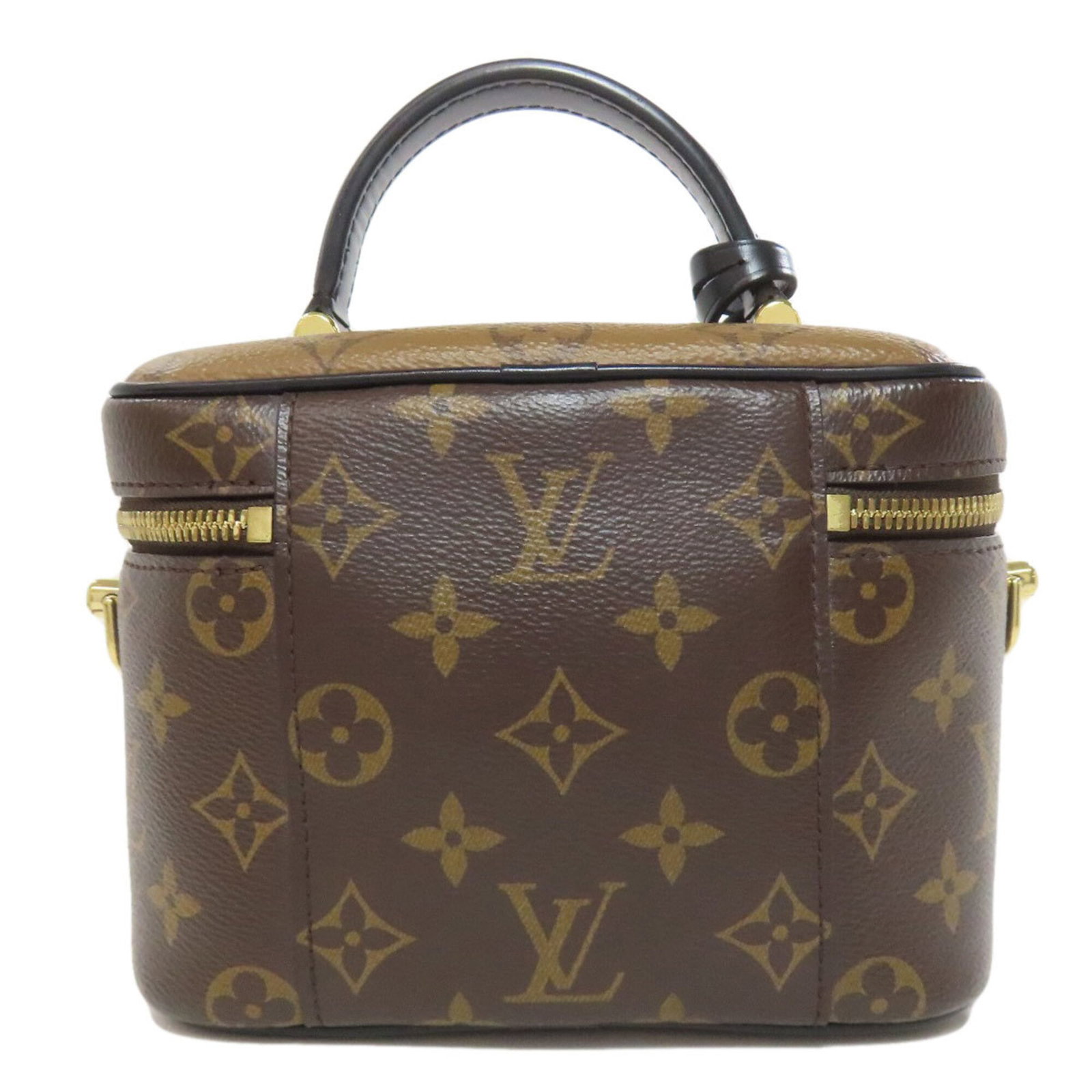 Monogram Reverse Handbag Vuitton Louis: Monogram Reverse Handbag Vuitton Louis Monogram Reverse Vuitton Louis Handbag - A stylish and iconic design, this Louis Vuitton handbag boasts the signature Monogram Reverse pattern, adding a touch of