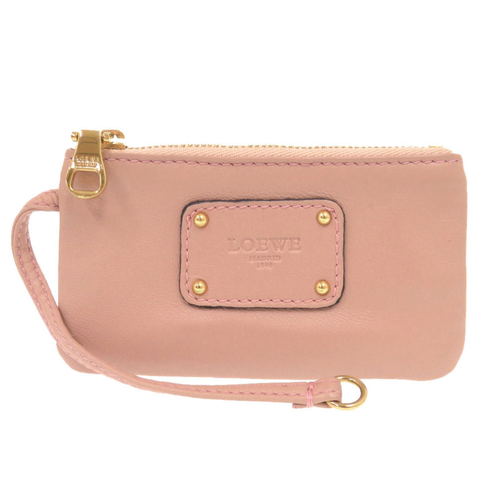 Loewe Coin Purse/ Coin Case Leather: Loewe Coin Purse/ Coin Case Leather Pink Loewe Coin Purse in Leather with Zipper Closure. This small, stylish purse measures 7cm x 12cm and features a soft pink leather exterior. Its compact size and