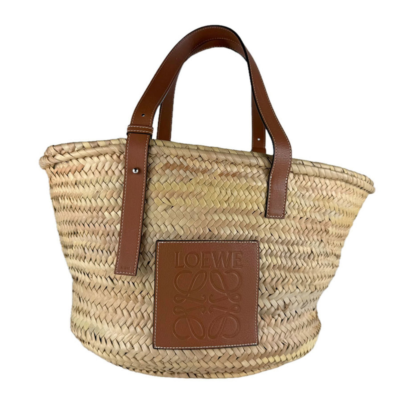 Raffia Leather Handbag Basket Loewe: Raffia Leather Handbag Basket Loewe Raffia Leather Handbag Basket Loewe is made from a combination of raffia and leather materials, characteristic of the brand's signature style. The basket handbag fe
