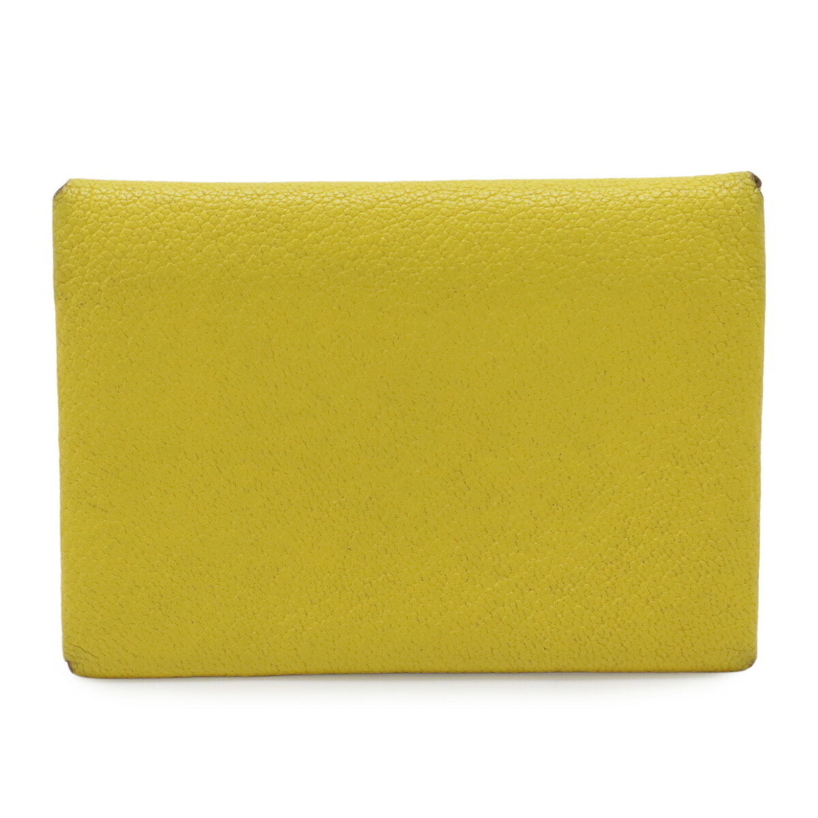 Hermes Coin Case Leather Purse Chevre: Hermes Coin Case Leather Purse Chevre The Hermes Coin Case Leather Purse Chevre boasts a vibrant yellow chevre leather exterior, showcasing a unique and stylish design. Measuring 7.5cm x 10.5cm, this 