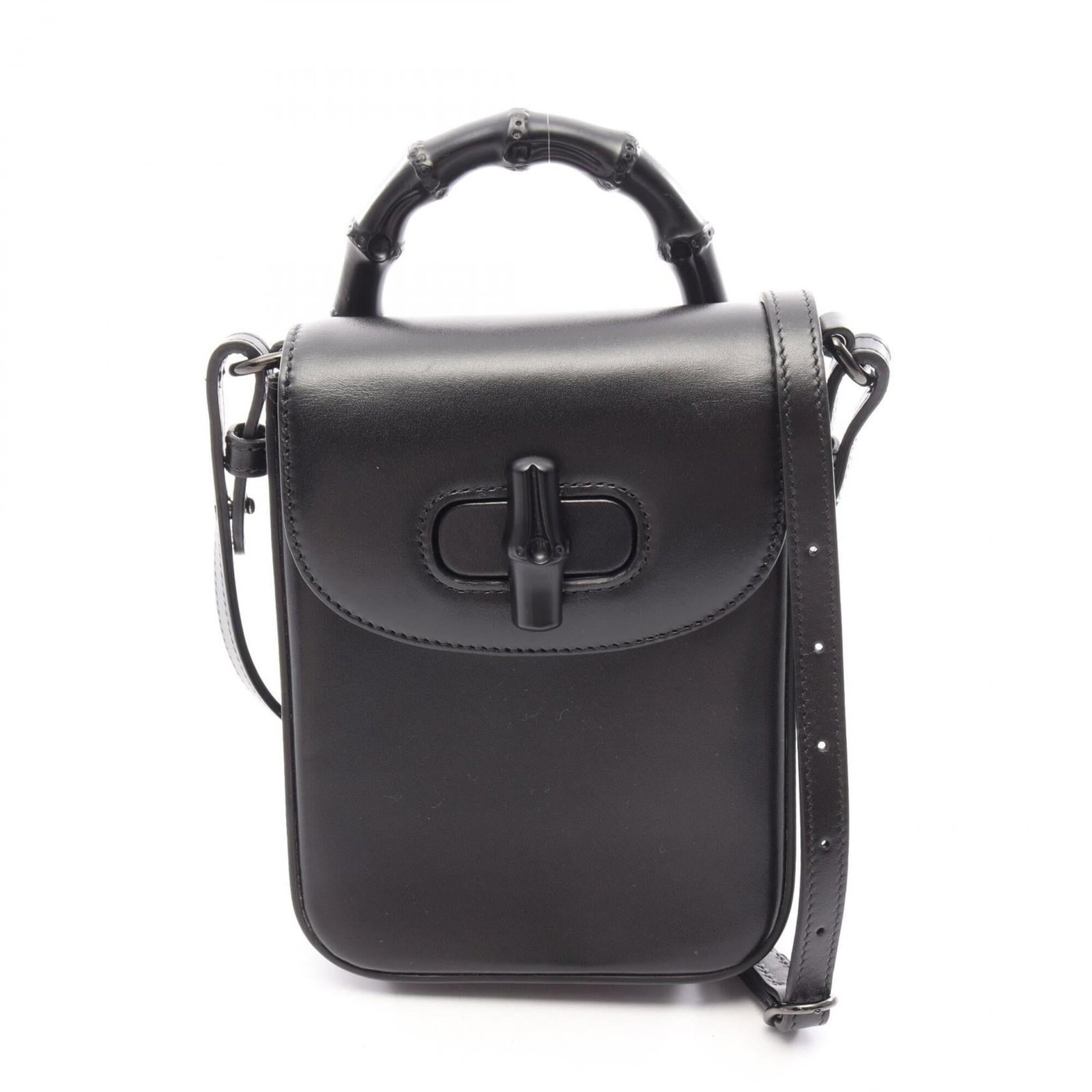 Handbag Leather Gucci: Handbag Leather Gucci Black leather Gucci handbag with dimensions 17.5cm x 13cm x 4cm. The bag features high-quality leather construction and a sleek, classic design. A signature is present on the