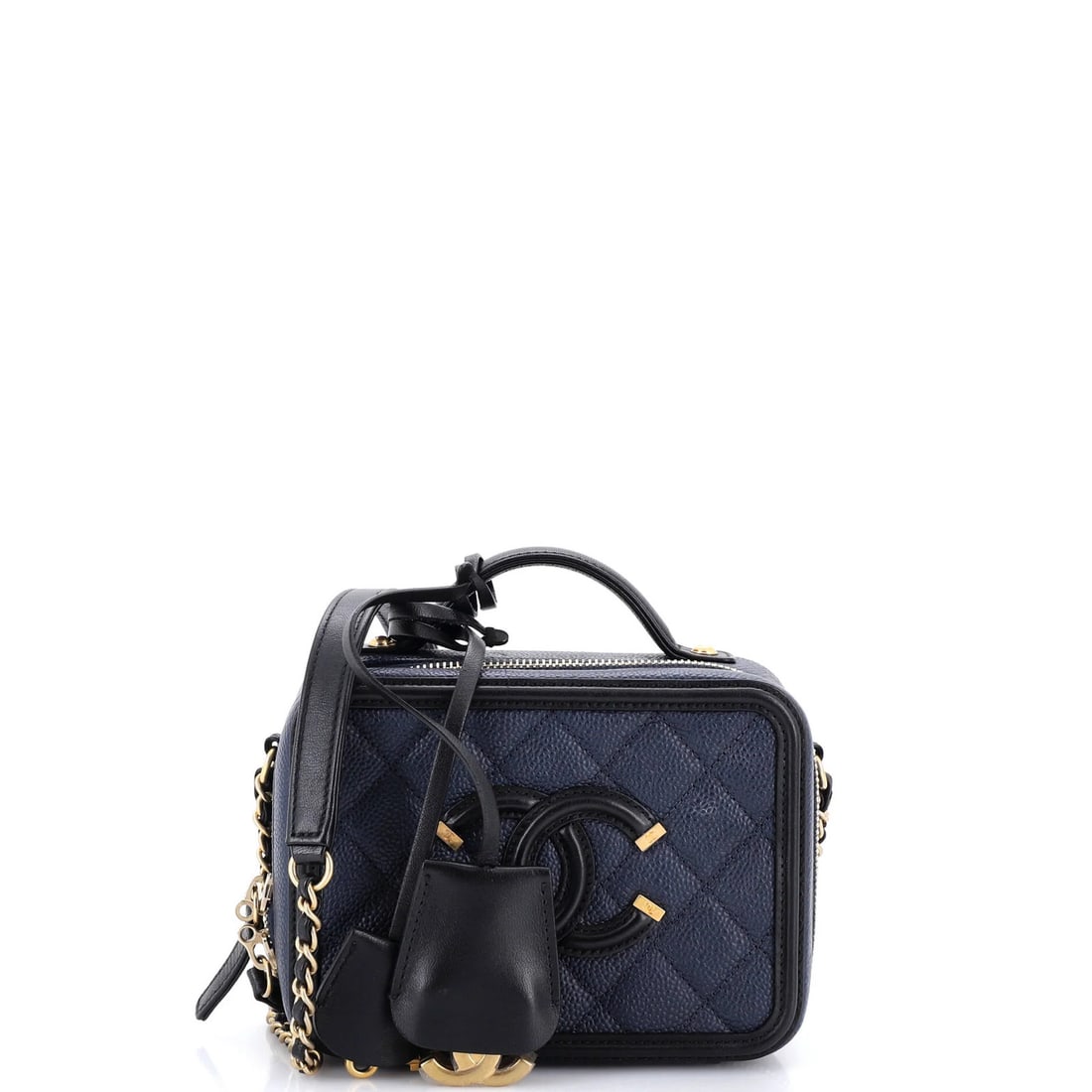 Caviar Filigree Quilted Chanel Small Vanity Case: Caviar Filigree Quilted Chanel Small Vanity Case Small Quilted Caviar Filigree Vanity Case in luxurious blue leather, adorned with gold hardware, and featuring a classic top handle. This stylish Chane