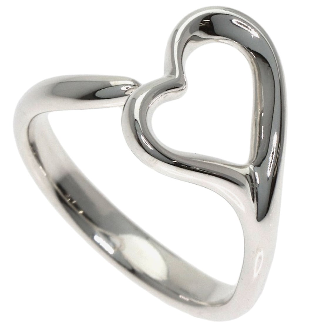 Silver Heart Ring Open Tiffany&Co: Silver Heart Ring Open Tiffany&Co Silver Heart Ring Open Tiffany&Co is a beautiful piece featuring an open design with a silver metal exterior. This ring bears a signature and is made from silver, wit