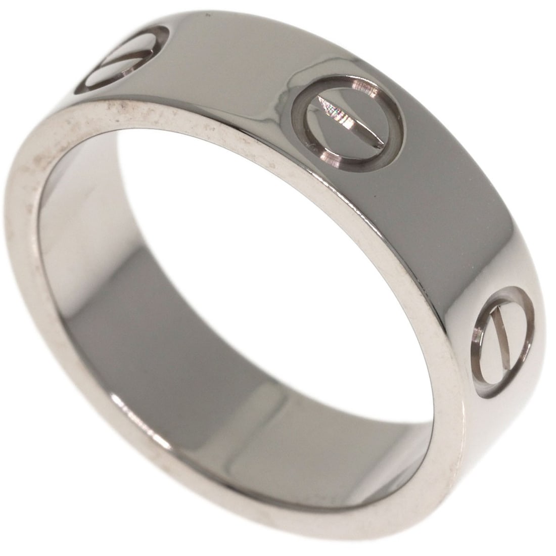 White Gold K18 Love Ring Cartier #51: White Gold K18 Love Ring Cartier #51 K18 White Gold Cartier Love Ring #51 boasts a sleek, silver metal design with an open ring closure, making it a stylish and versatile accessory. This Cartier ring