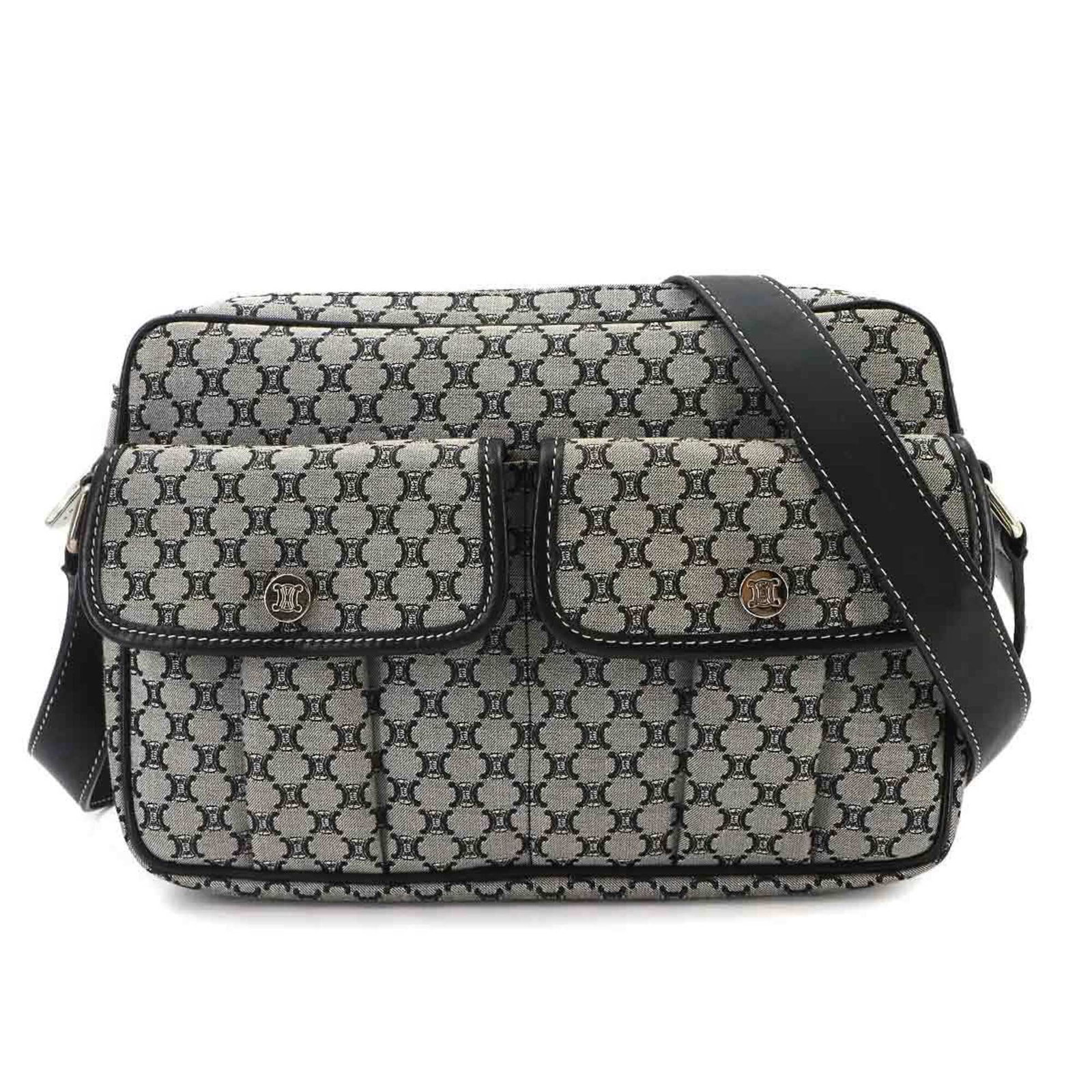 Shoulder Bag Canvas Leather Handbag: Shoulder Bag Canvas Leather Handbag Canvas and leather come together in this sleek shoulder bag, measuring 17cm x 23cm x 5.5cm. The black and gray color options provide a versatile choice, while the b