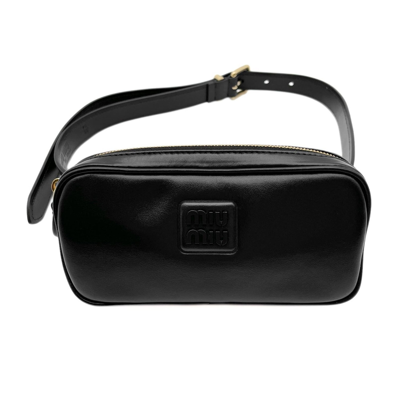 Miu Sling Bag Leather: Miu Sling Bag Leather Black leather sling bag with a sleek design, measuring 8.5cm x 17cm x 3cm. The bag's classic style is complemented by its simple, understated color. A small, signed work adorns