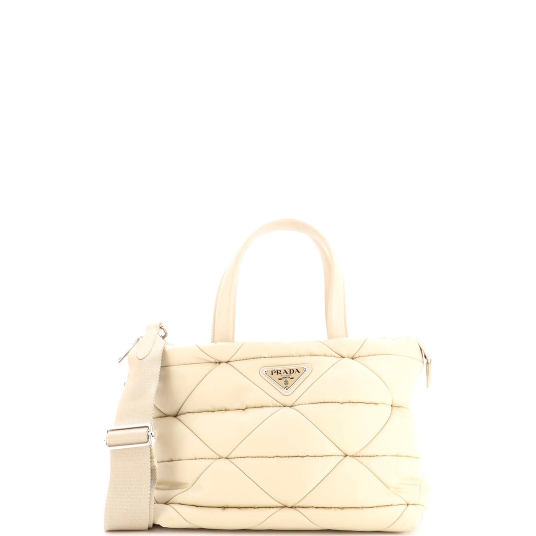 Prada Padded Tote Bag Quilted Re-Nylon with Leather Mini: Prada Padded Tote Bag Quilted Re-Nylon with Leather Mini The Prada Padded Tote Bag Quilted Re-Nylon with Leather Mini is a stylish and functional accessory, featuring a neutral exterior and quilted de