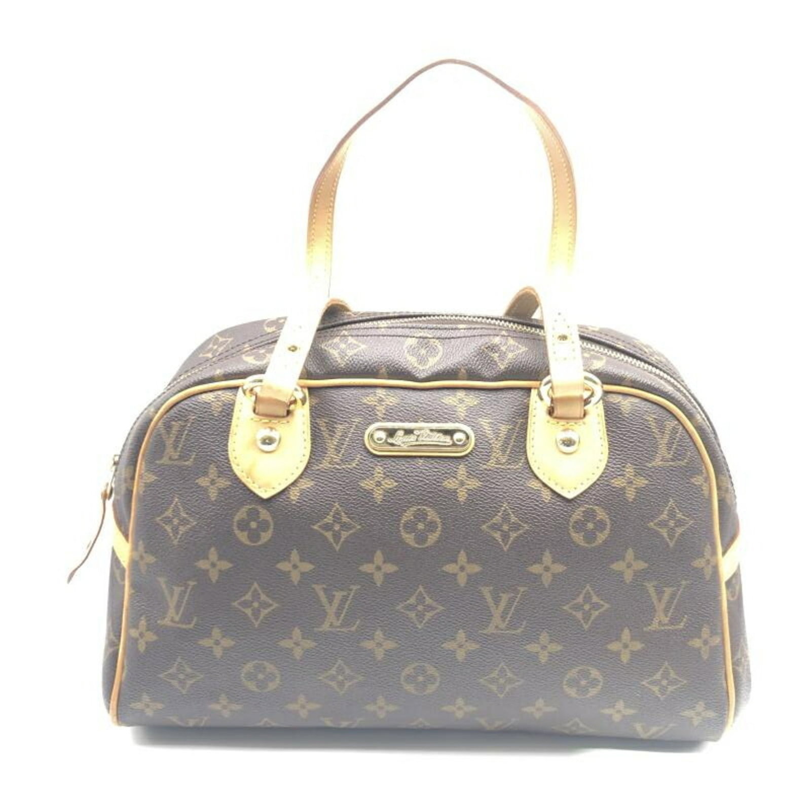 Montorgueil Gm M95566 Louis Vuitton Bag: Montorgueil Gm M95566 Louis Vuitton Bag Monogram pattern adorns this Louis Vuitton bag, crafted from Monogram material. Measuring 20cm x 31.5cm x 14cm, it features a signature. The bag's design is