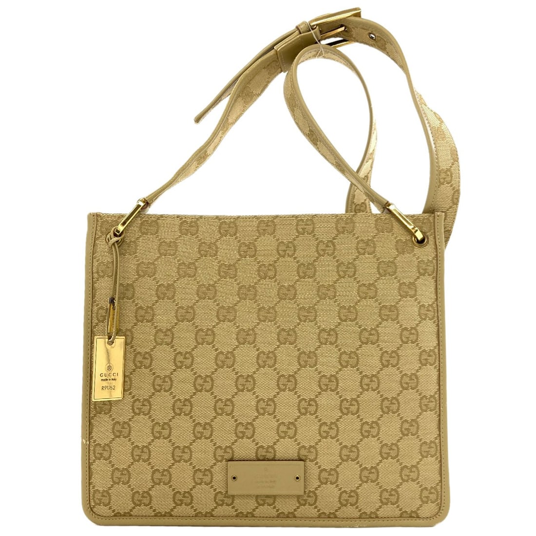 Shoulder Bag Canvas Gucci 91762: Shoulder Bag Canvas Gucci 91762 Beige canvas shoulder bag with classic Gucci design, bearing a signature. This iconic style combines timeless elegance with versatile functionality, perfect for