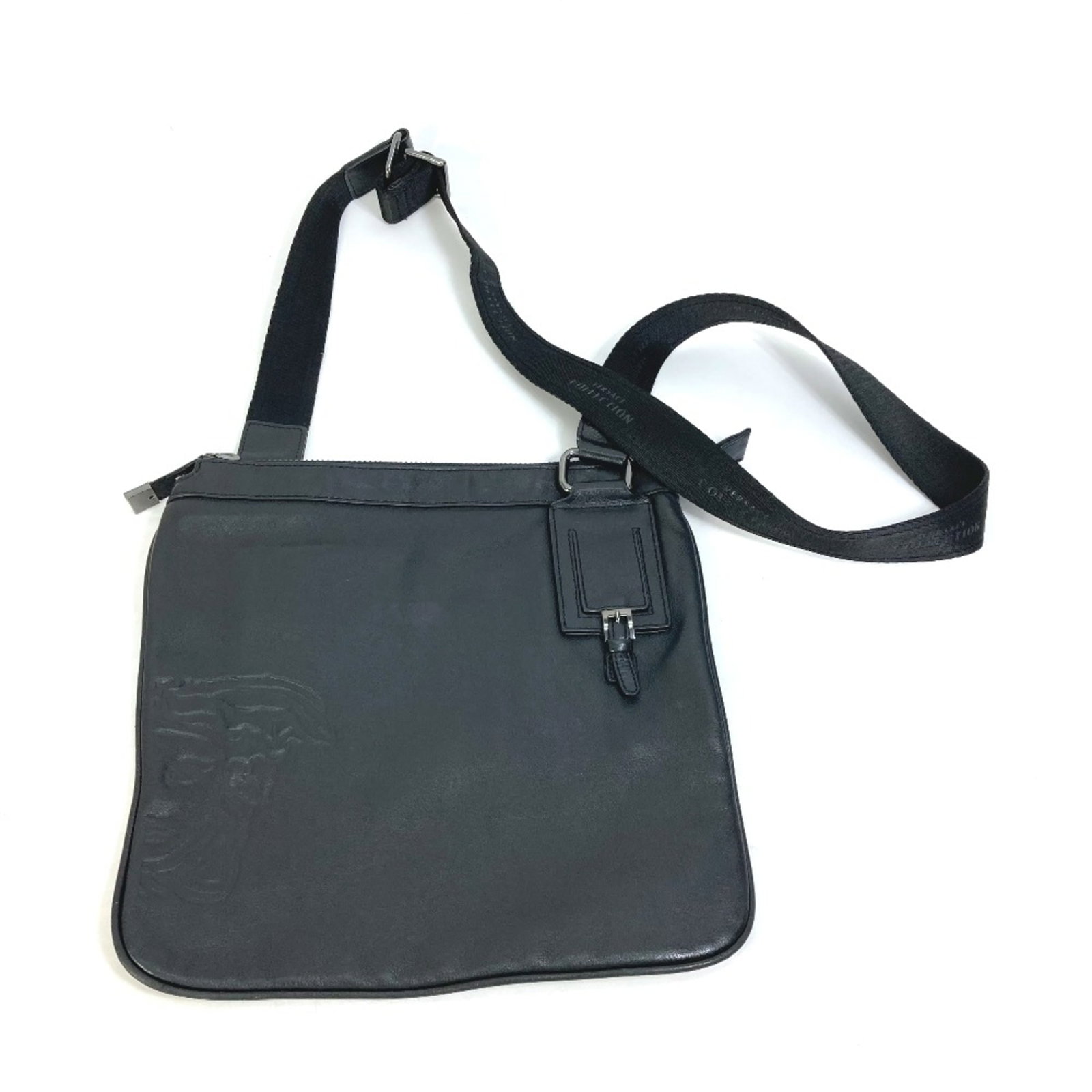 Shoulder Bag Leather Versace: Shoulder Bag Leather Versace Versace's signature black leather shoulder bag boasts a sleek, modern design with clean lines and a spacious interior. Measuring 28cmx28.5cm, this stylish bag features a s