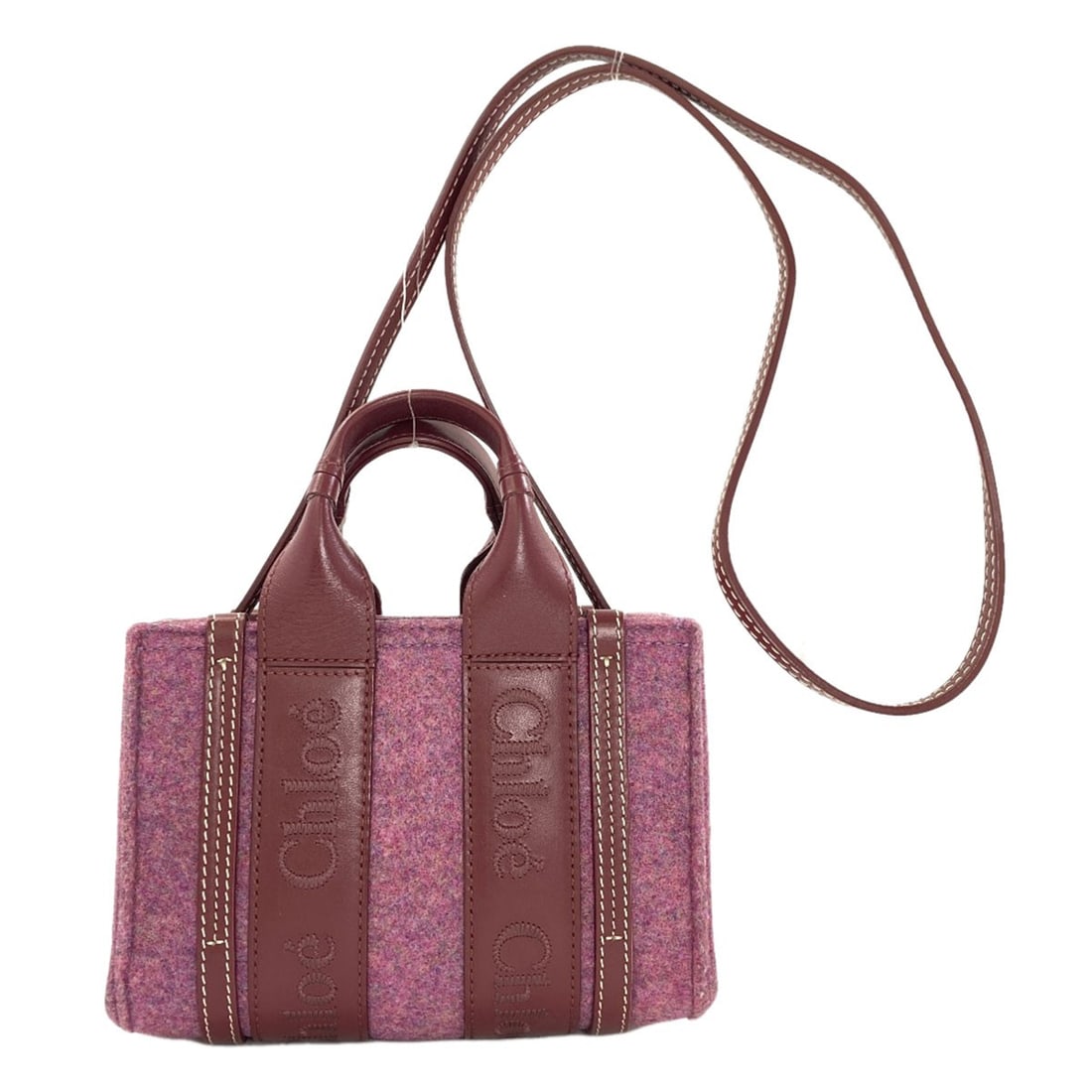 Chloe 2Way Handbag Felt Leather Mini: Chloe 2Way Handbag Felt Leather Mini Pink Chloe 2Way Handbag Felt Leather Mini features a pink exterior made from felt, a stylish and unique material choice. This mini handbag boasts a 2Way design, ad