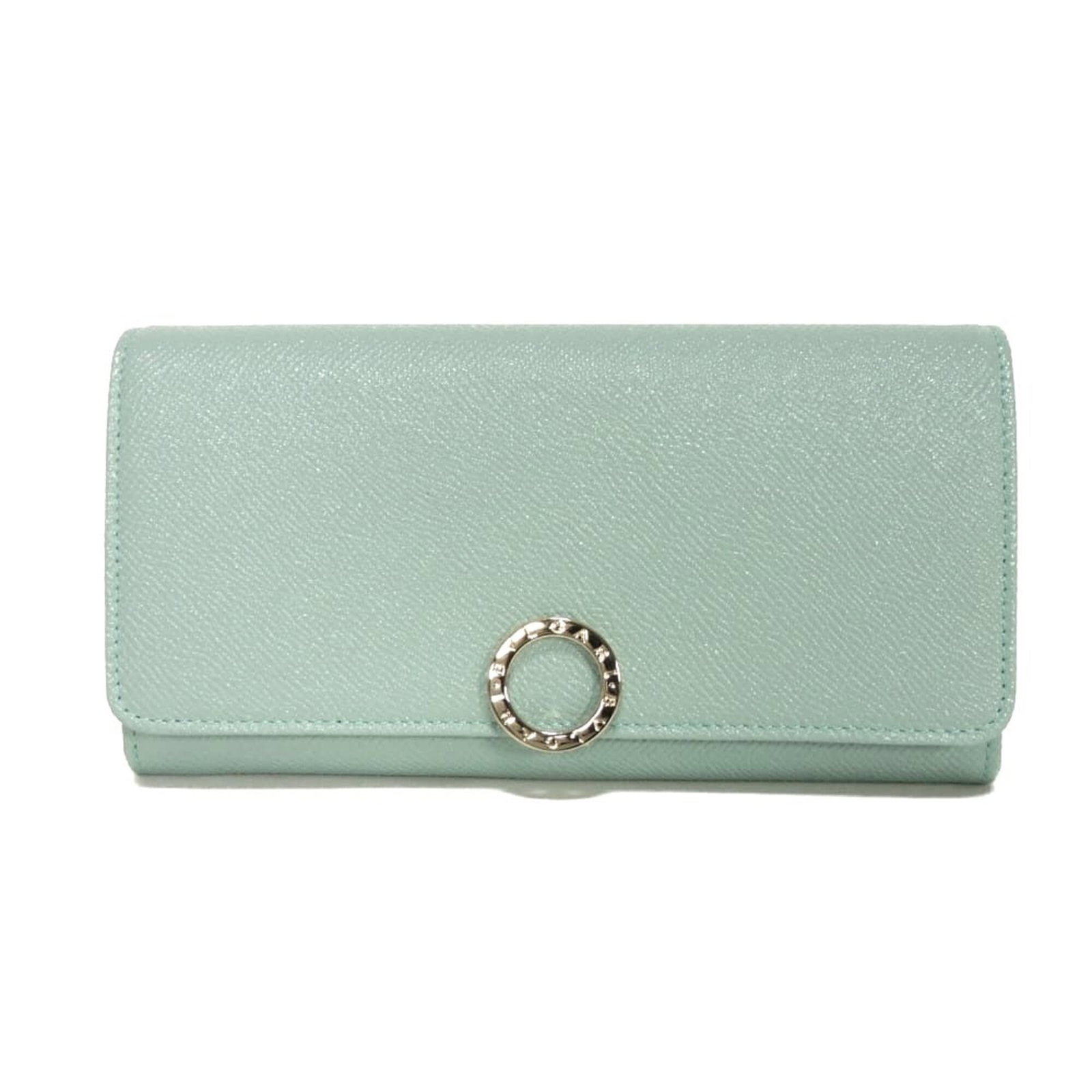 Bvlgari Long Wallet (Bi-Fold) Leather: Bvlgari Long Wallet (Bi-Fold) Leather Bvlgari's Long Wallet is a stylish bi-fold leather accessory, measuring 10.3cm x 19cm x 3.8cm, with a sleek blue color. This Italian-made wallet features high-qua