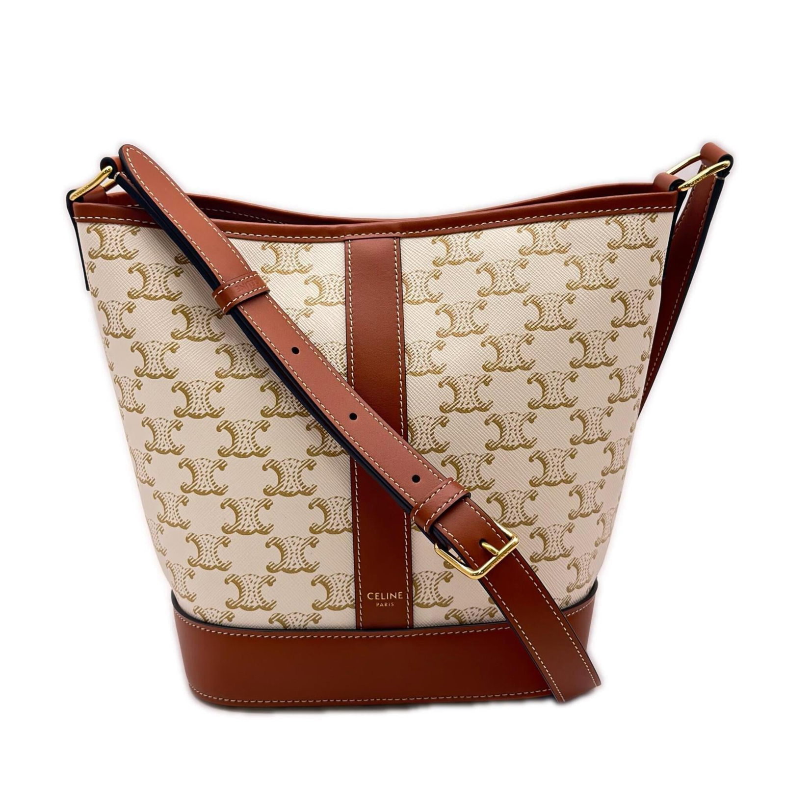 Shoulder Bag Leather Coated Celine Canvas: Shoulder Bag Leather Coated Celine Canvas Coated canvas and leather come together in this stylish shoulder bag from Celine, with a sleek beige and white color combination. Measuring 22cm x 18cm x