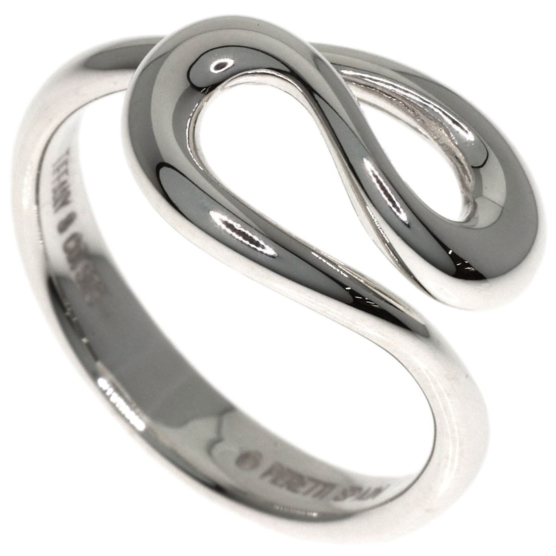 Open Wave Ring Tiffany Silver: Open Wave Ring Tiffany Silver Tiffany&Co.'s Open Wave Ring is a striking silver piece, showcasing a unique wave design. Made from sterling silver, this ring features a silver exterior and measures 4.2