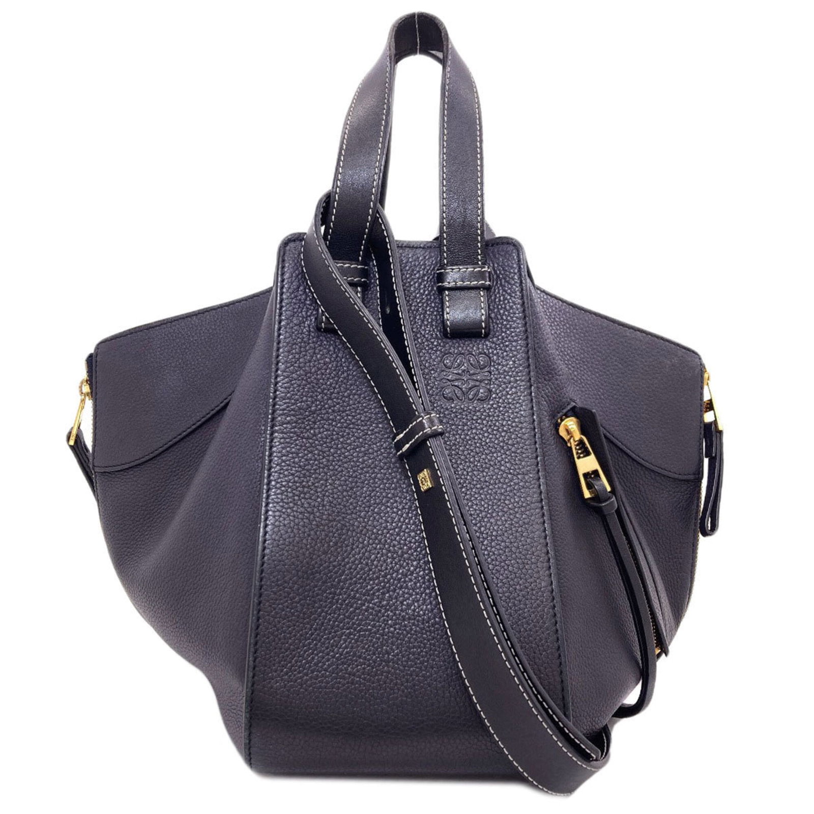 Handbag Leather Handbag: Handbag Leather Handbag The Loewe Hammock handbag is crafted from rich, supple calfskin leather in a sleek black and dark navy color combination. Measuring 24cm x 31cm x 26cm, this stylish bag feature