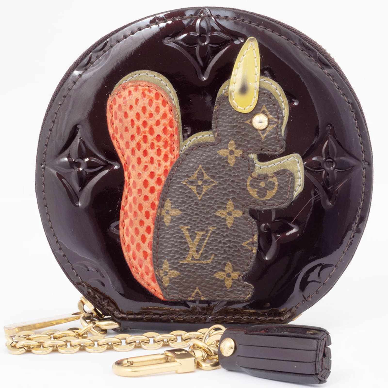 Louis Vuitton Monogram Vernis Coin Case Purse: Louis Vuitton Monogram Vernis Coin Case Purse The Louis Vuitton Monogram Vernis Coin Case Purse boasts a sleek design with the iconic Monogram Vernis pattern, adding a touch of luxury to any outfit. M