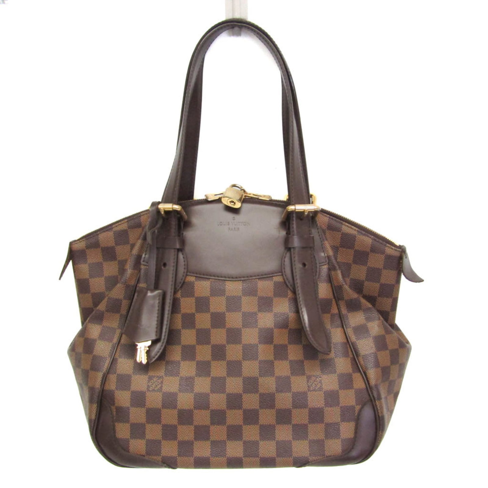Shoulder Bag Damier Canvas By Louis Vuitton: Shoulder Bag Damier Canvas By Louis Vuitton Damier Canvas by Louis Vuitton - A Timeless Shoulder Bag. This iconic shoulder bag features the signature Damier canvas design, with Ebene color and a
