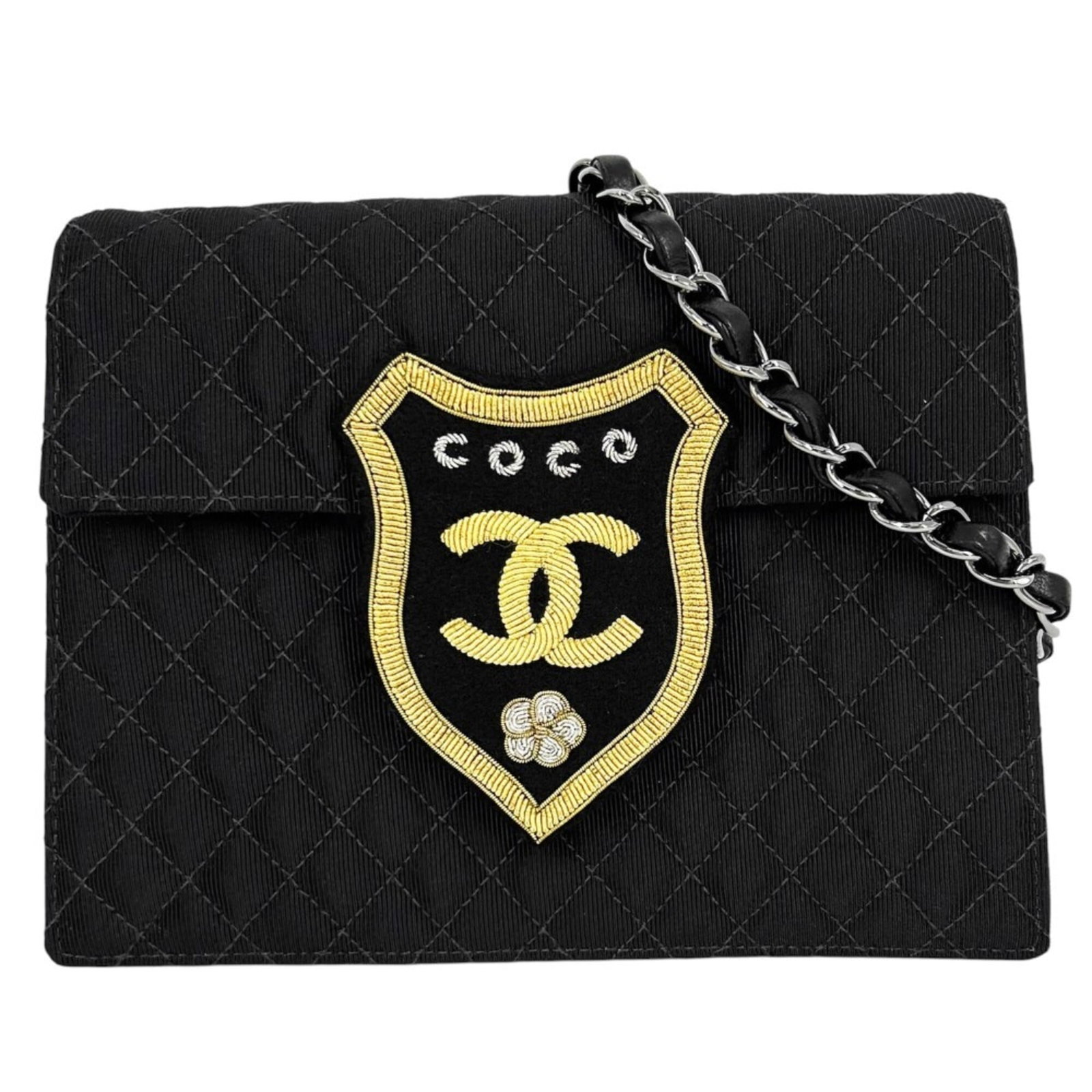 Shoulder Bag Canvas Leather Chanel: Shoulder Bag Canvas Leather Chanel Canvas and leather combine in this sleek black shoulder bag from the Chanel Matelasse line. Measuring 15cm x 19.5cm x 3.5cm, it features a strap length of 112cm.