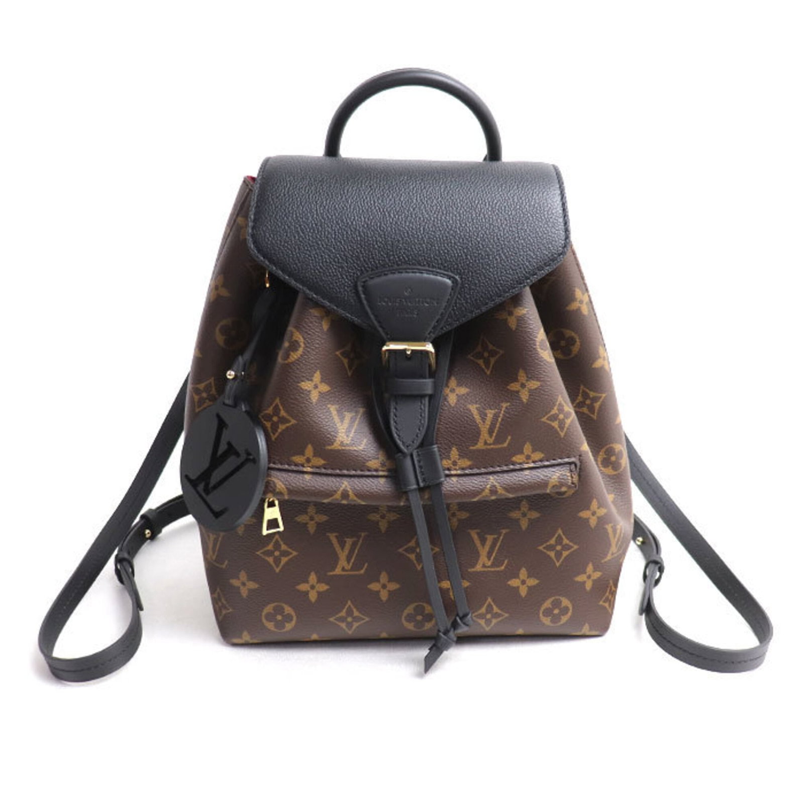 Vuitton Louis Monogram Backpack: Vuitton Louis Monogram Backpack Monogram pattern adds a touch of elegance to this Louis Vuitton Louis Monogram Backpack, crafted from high-quality materials. Measuring 27cm x 27cm x 15cm, it features 